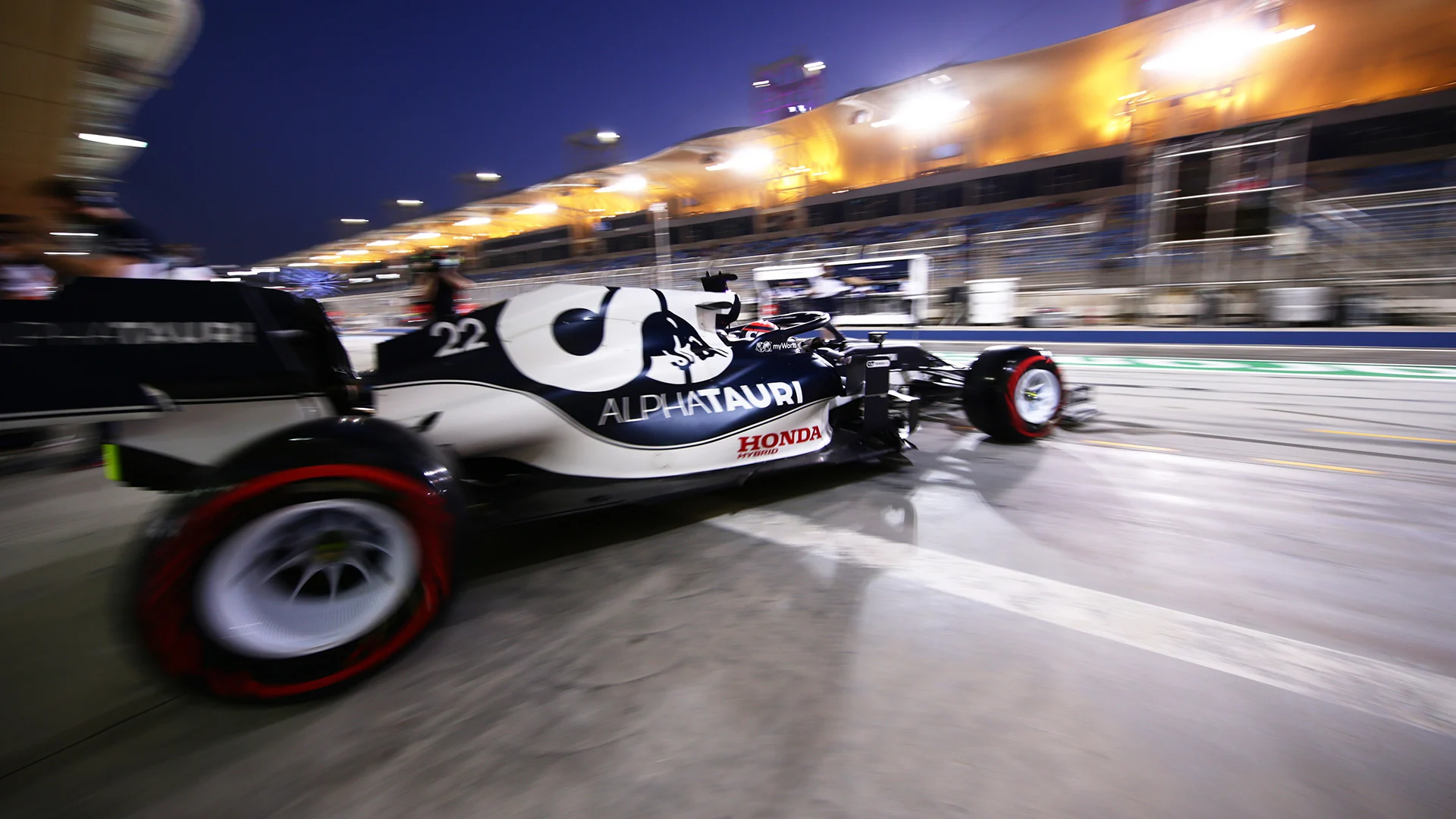 BAHRAIN, BAHRAIN - MARCH 27: Yuki Tsunoda of Japan driving the (22) Scuderia AlphaTauri AT02 Honda