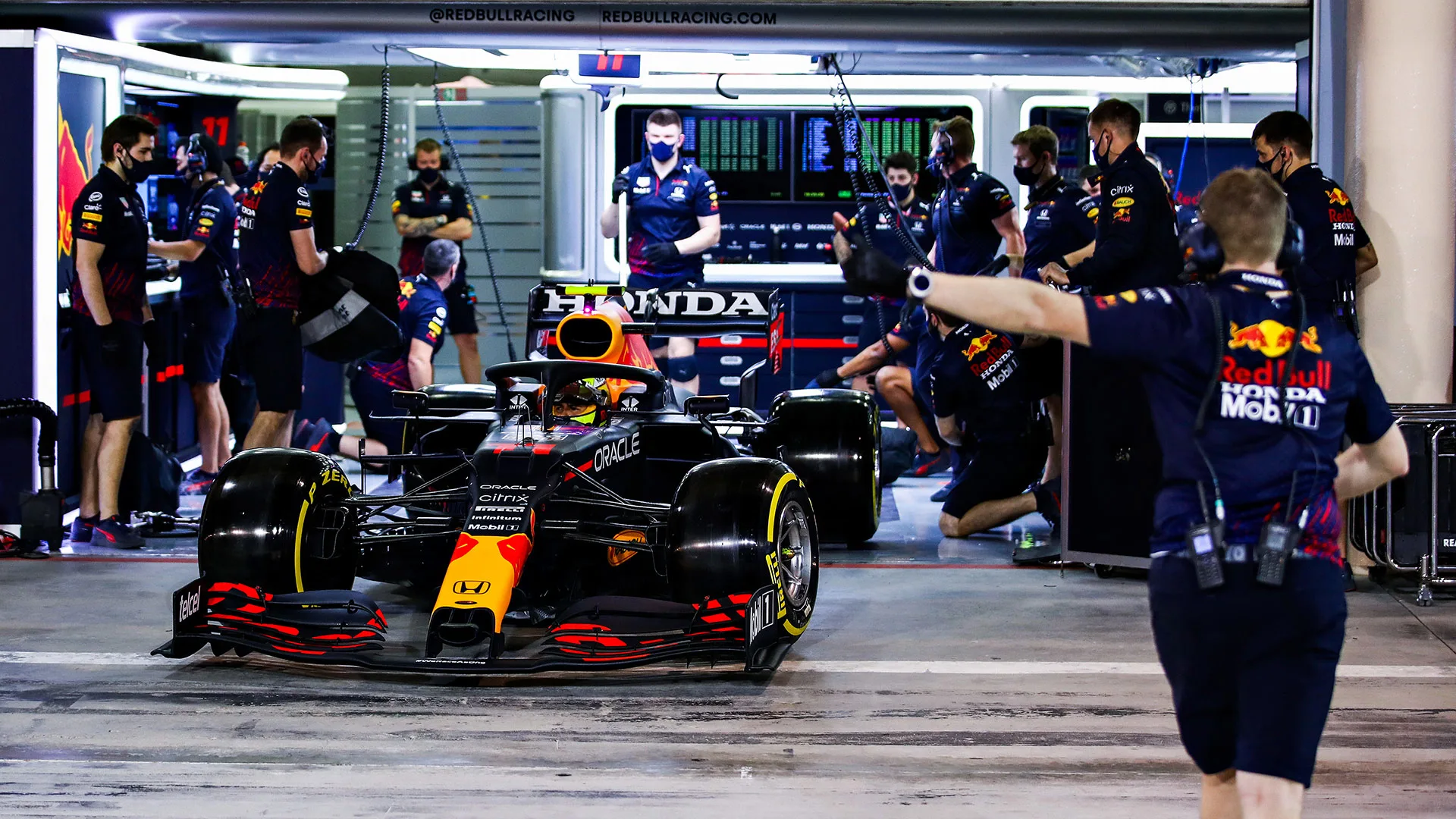 BAHRAIN, BAHRAIN - MARCH 27: Sergio Perez of Mexico driving the (11) Red Bull Racing RB16B Honda