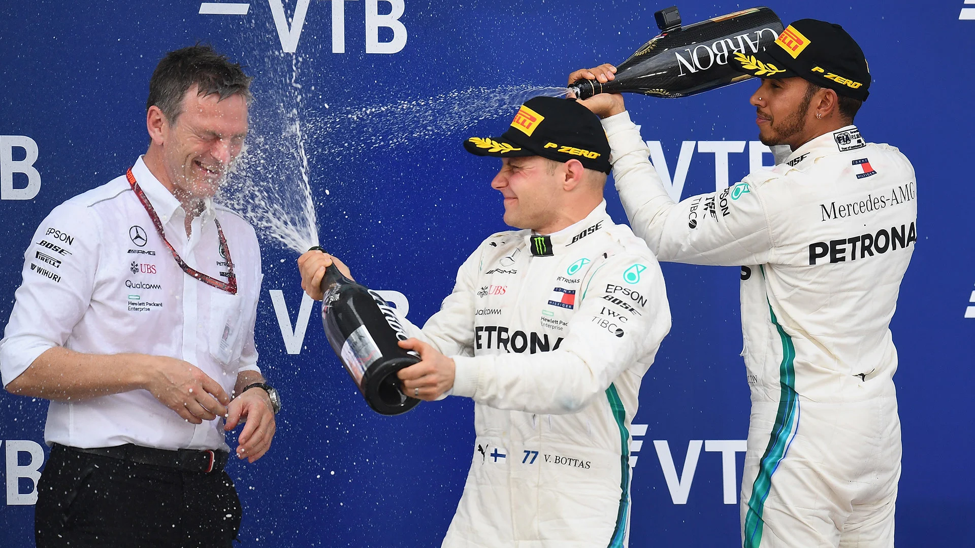 SOCHI, RUSSIA - SEPTEMBER 30: Race winner Lewis Hamilton of Great Britain and Mercedes GP, second
