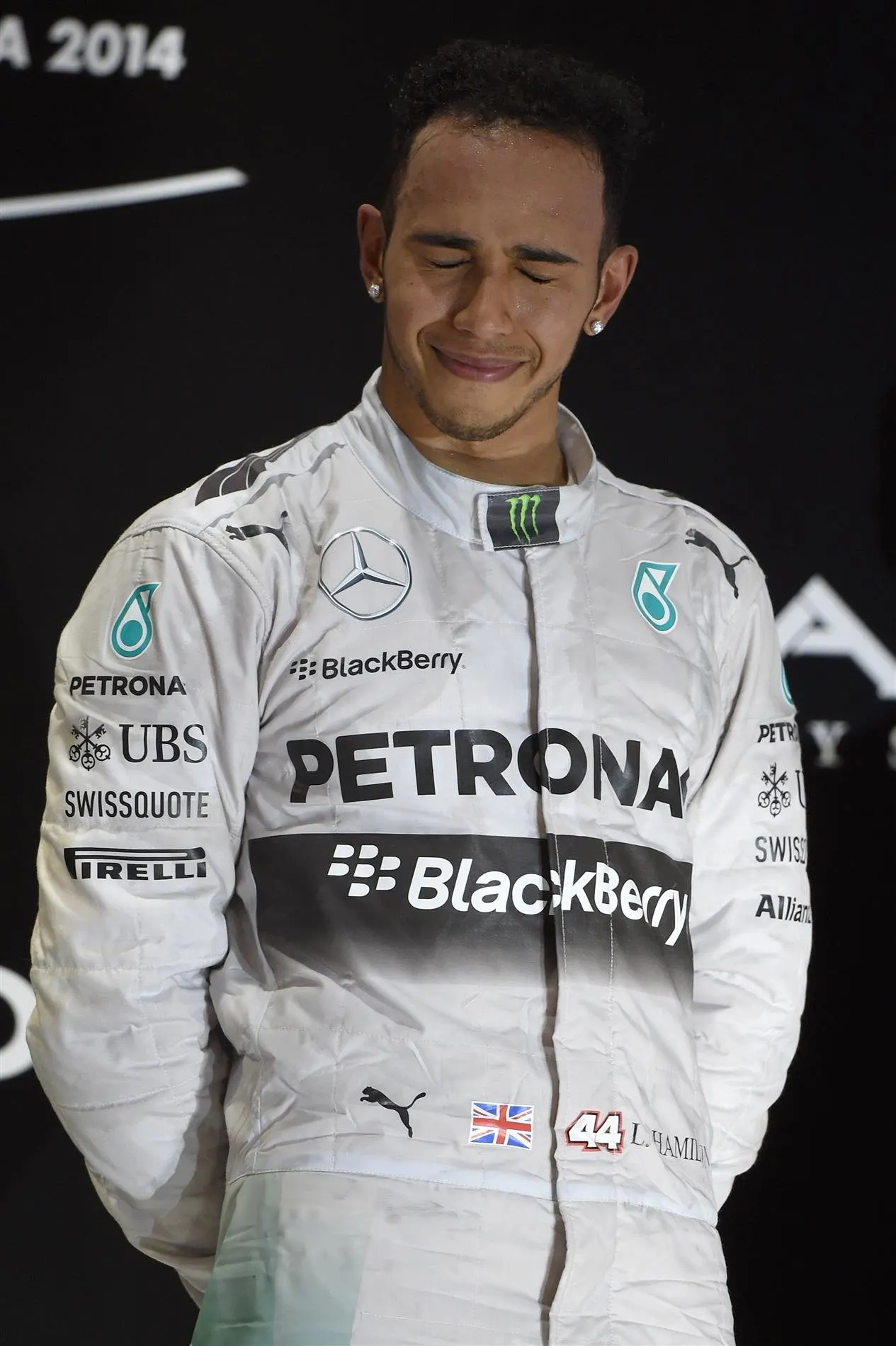 Lewis Hamilton (GBR) Mercedes AMG F1 celebrates on the podium. Formula One World Championship, Rd19, Abu Dhabi Grand Prix, Race, Yas Marina Circuit, Abu Dhabi, UAE, Sunday, 23 November 2014