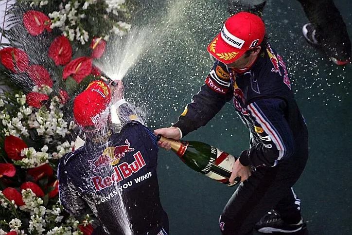 Mark Webber (AUS) Red Bull Racing and Sebastian Vettel (GER) Red Bull Racing on the podium. Formula One World Championship, Rd 3, Chinese Grand Prix, Race Day, Shanghai, China, Sunday, 19 April 2009
