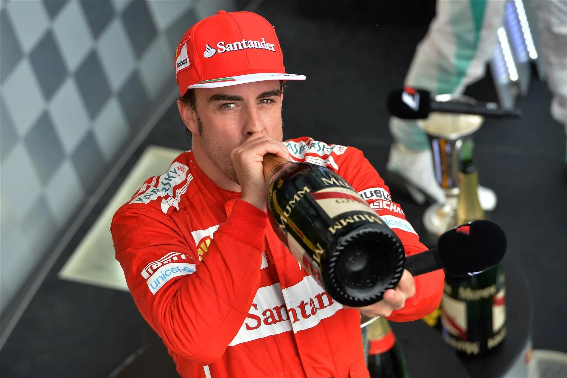 Second placed finisher Fernando Alonso (ESP) Ferrari drinks champagne On the podium. Formula One World Championship, Rd11, Hungarian Grand Prix, Race Day, Hungaroring, Hungary. Sunday, 27 July 2014 © Sutton Images. No reproduction without permission