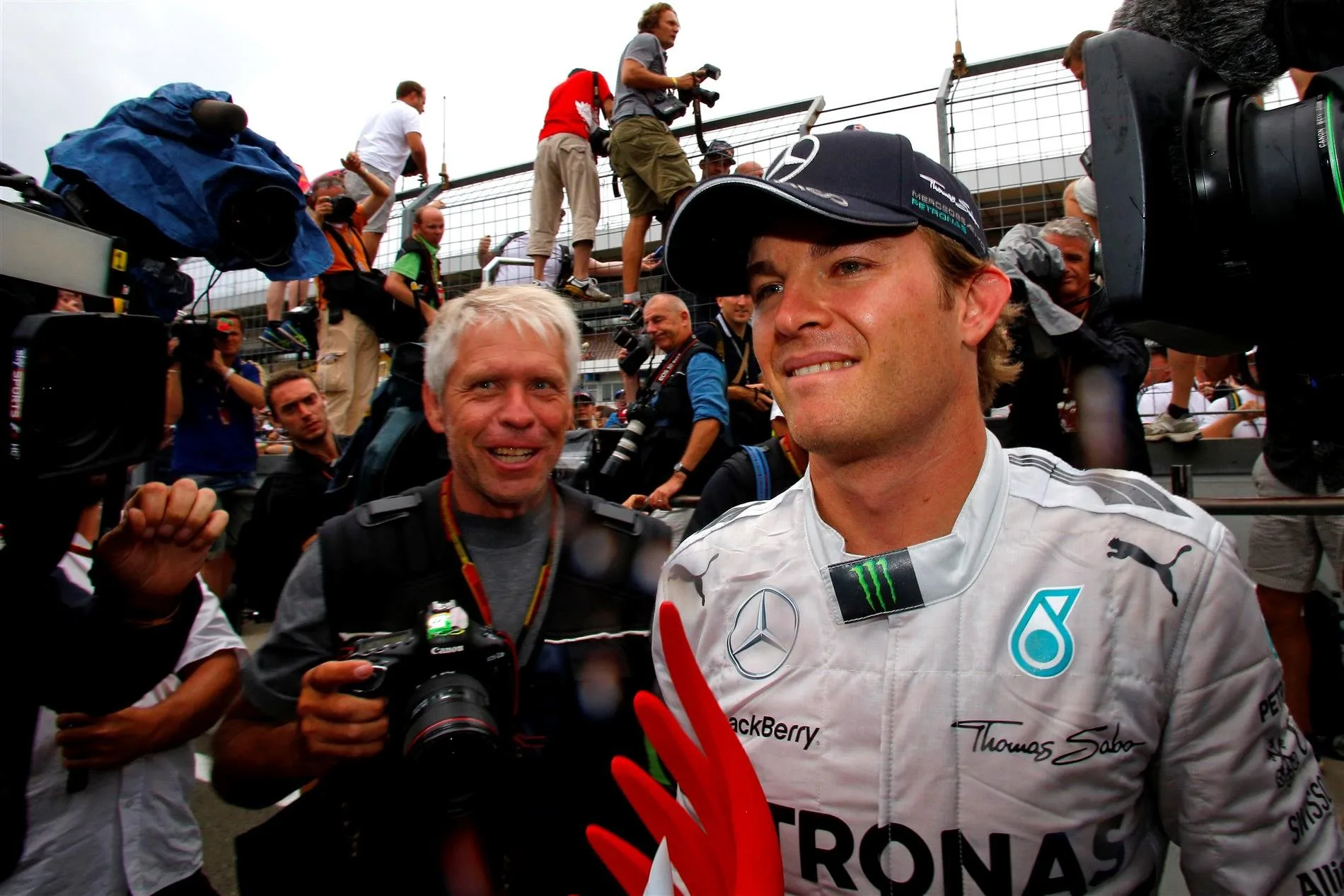 Race winner Nico Rosberg (GER) Mercedes AMG F1 celebrates with his team. Formula One World Championship, Rd10, German Grand Prix, Race Day, Hockenheim, Germany, Sunday, 20 July 2014 © Sutton Images. No reproduction without permission