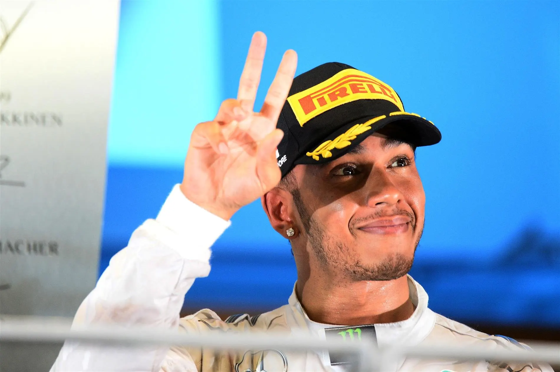 Race winner Lewis Hamilton (GBR) Mercedes AMG F1 celebrates on the podium. Formula One World Championship, Rd14, Singapore Grand Prix, Marina Bay Street Circuit, Singapore, Race Day, Sunday, 21 September 2014 © Sutton Images. No reproduction without permission