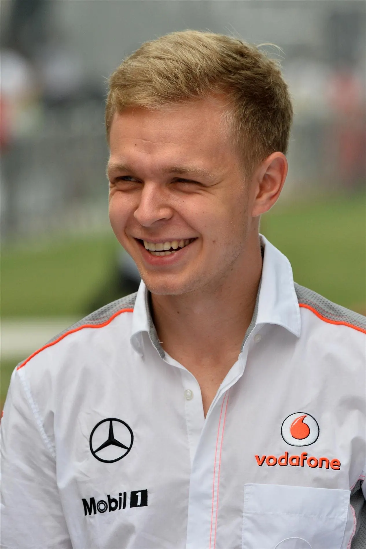 Tom Kristensen (DEN) talks with Kevin Magnussen (DEN) McLaren. Formula One World Championship, Rd16, Indian Grand Prix, Buddh International Circuit, Greater Noida, New Delhi, India, Practice, Friday, 25 October 2013. © Sutton Images