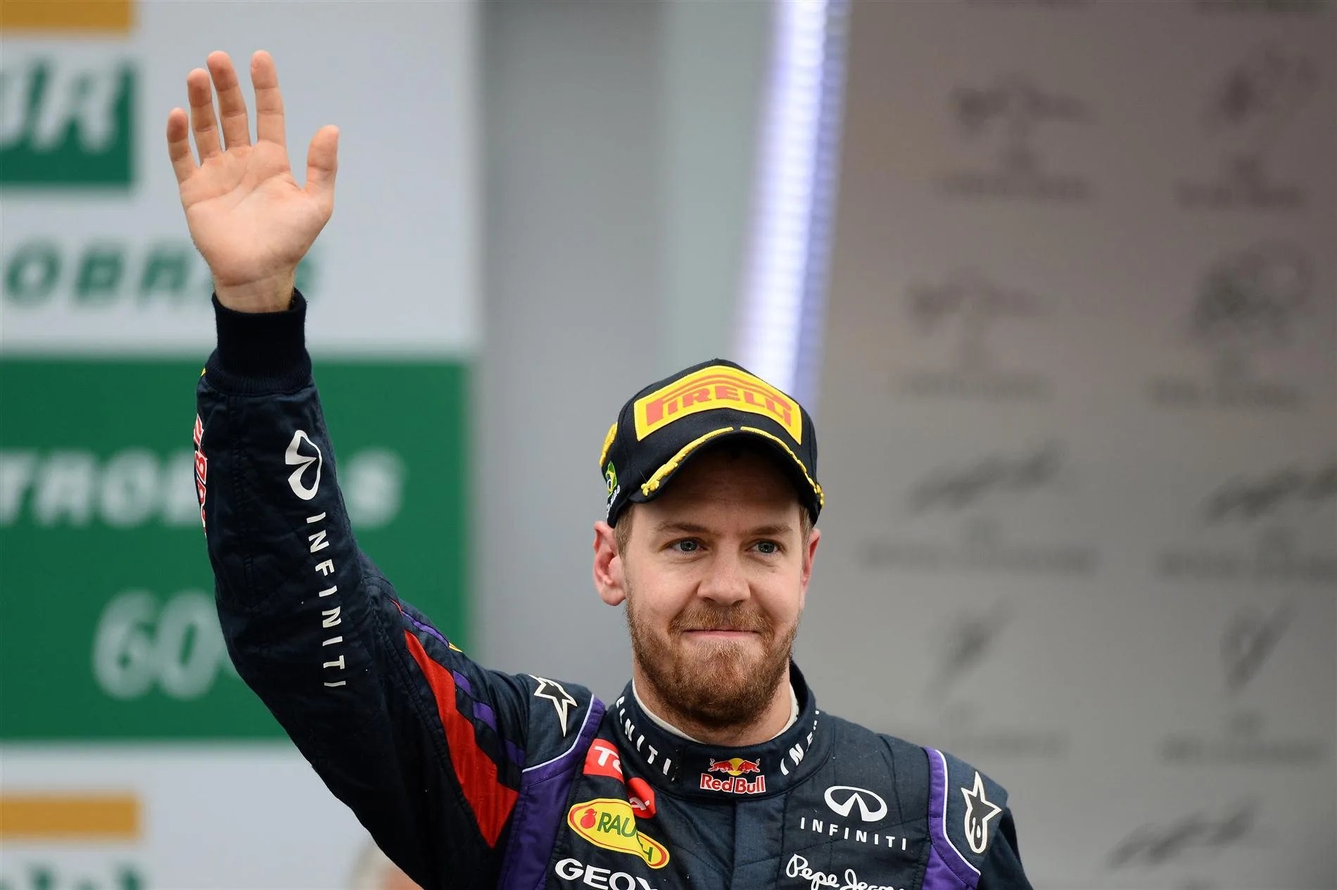 Race winner Sebastian Vettel (GER) Red Bull Racing on the podium. Formula One World Championship, Rd19, Brazilian Grand Prix, Race, Sao Paulo, Brazil, Sunday, 24 November 2013. © Sutton Images