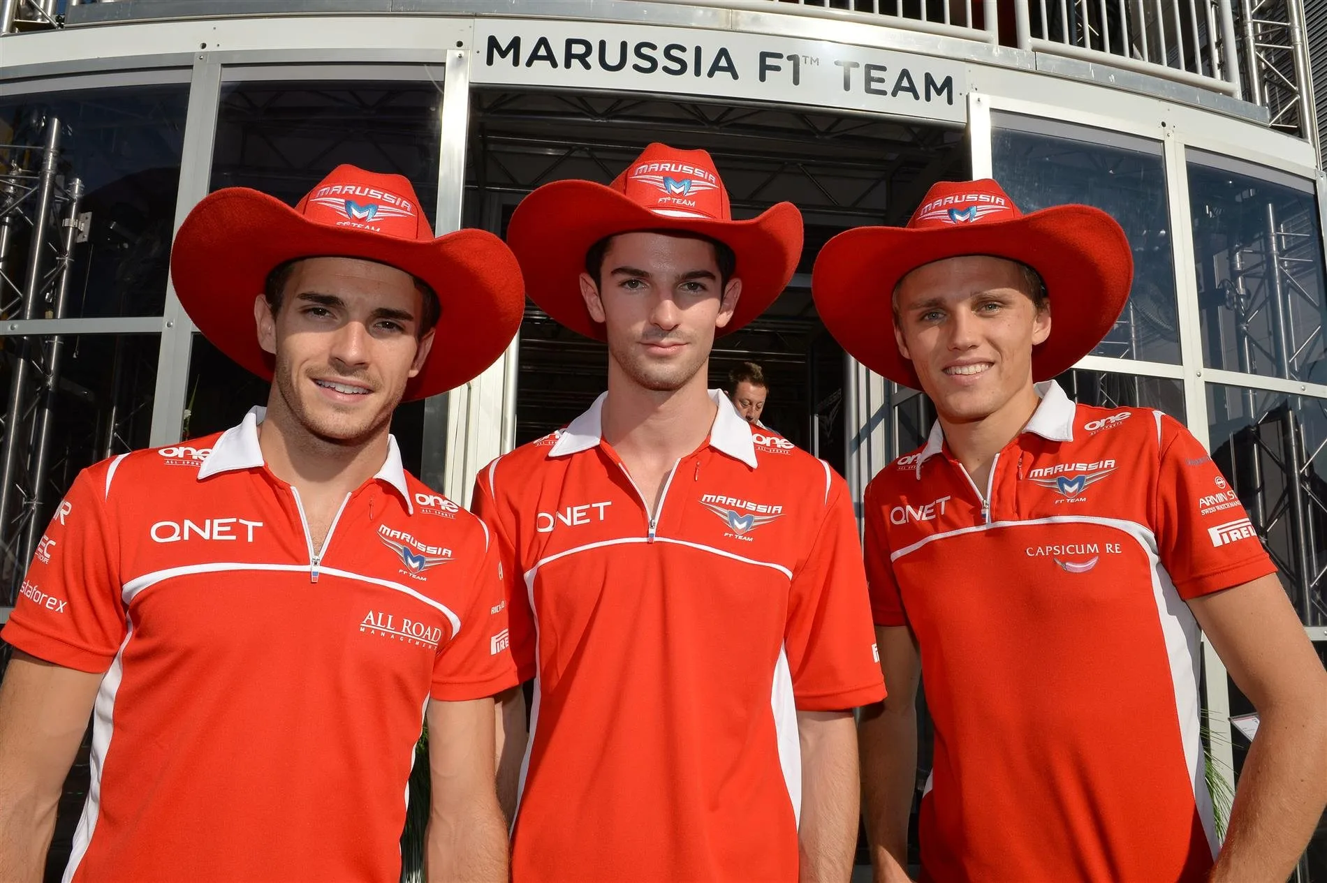 (L to R): Jules Bianchi (FRA) Marussia F1 Team, Alexander Rossi (ITA) Marussia and Max Chilton (GBR) Marussia F1 Team with the USGP cowboy hat. Formula One World Championship, Rd13, Italian Grand Prix, Monza, Italy, Qualifying, Saturday, 6 September 2014