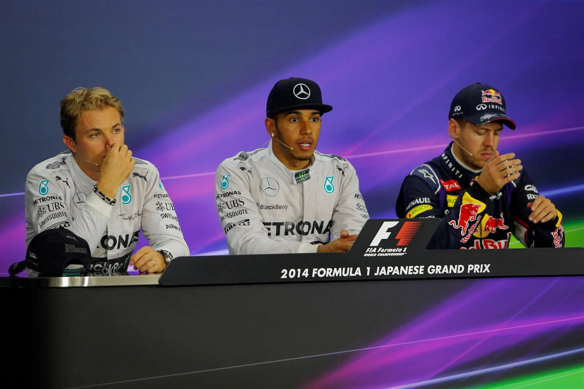 (L to R): Nico Rosberg (GER) Mercedes AMG F1, Lewis Hamilton (GBR) Mercedes AMG F1 and Sebastian Vettel (GER) Red Bull Racing in the Press Conference. Formula One World Championship, Rd15, Japanese Grand Prix, Race, Suzuka, Japan, Sunday, 5 October 2014