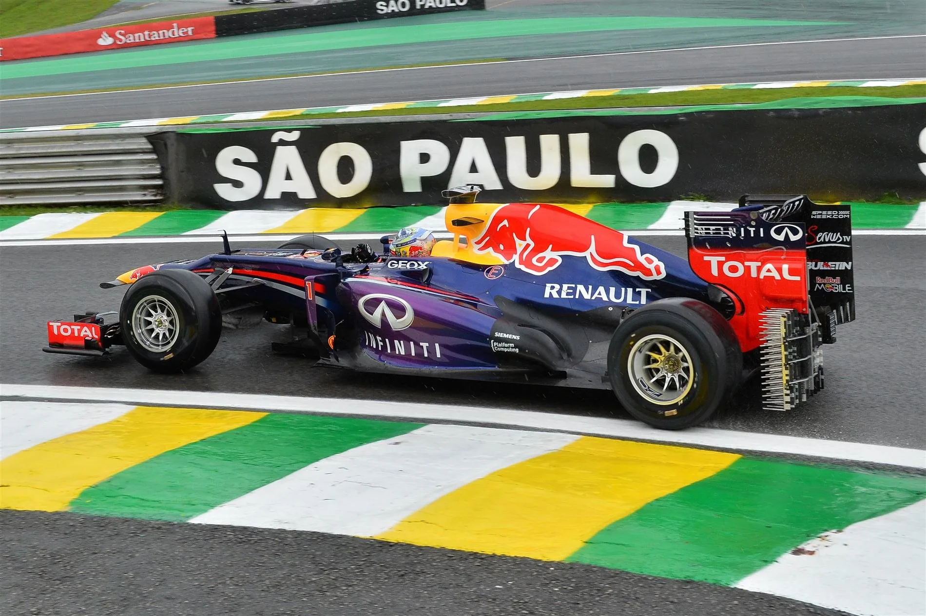 Sebastian Vettel (GER) Red Bull Racing RB9, with aero sensors and unbranded Pirelli 2014 development slick tyres. Formula One World Championship, Rd19, Brazilian Grand Prix, Practice, Sao Paulo, Brazil, Friday, 22 November 2013