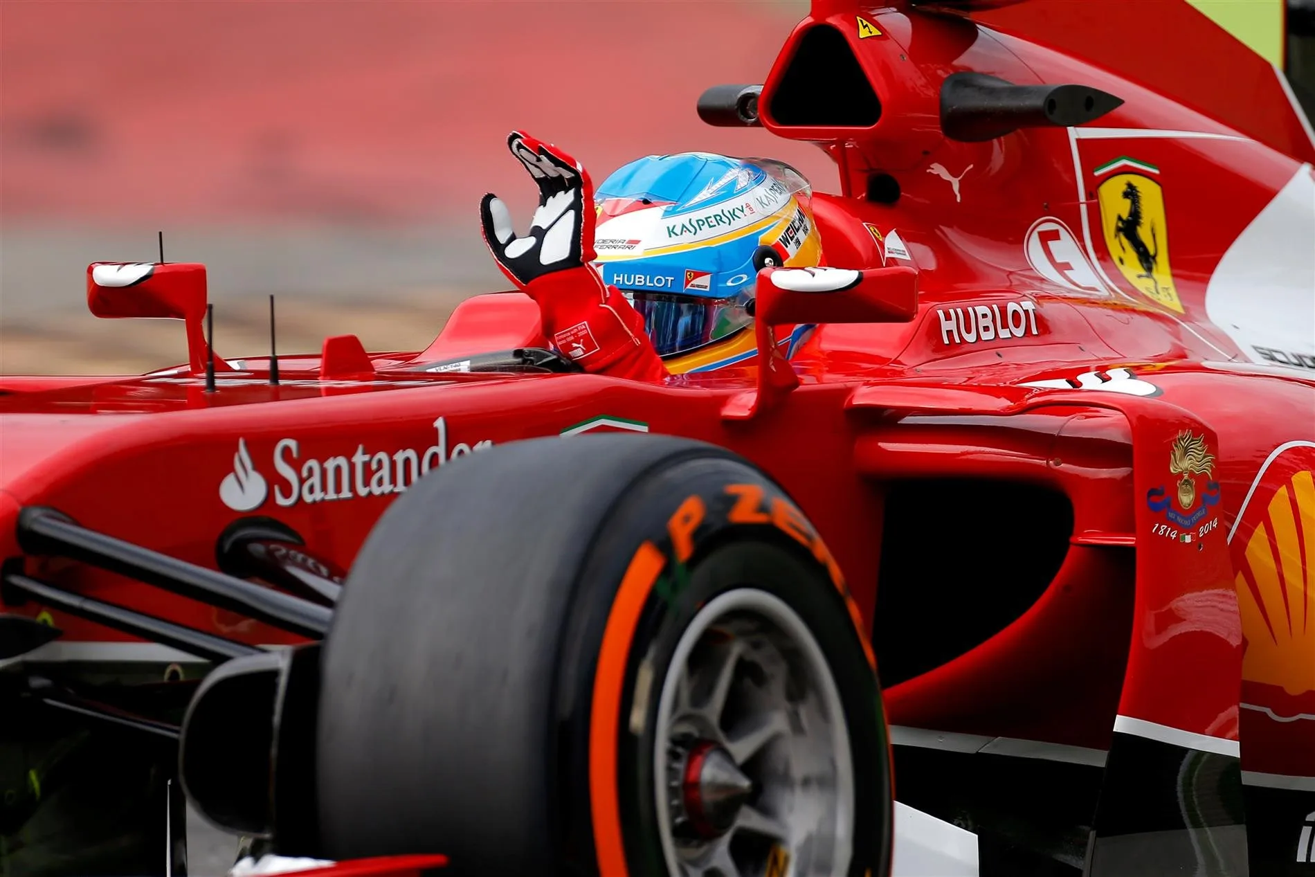Fernando Alonso (ESP) Ferrari F14 T waves tothe crowd. Formula One World Championship, Rd13, Italian Grand Prix, Monza, Italy, Practice, Friday, 5 September 2014 © Sutton Images. No reproduction without permission