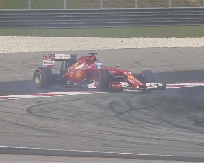 Fernando Alonso spins his Ferrari. © FOWC Ltd