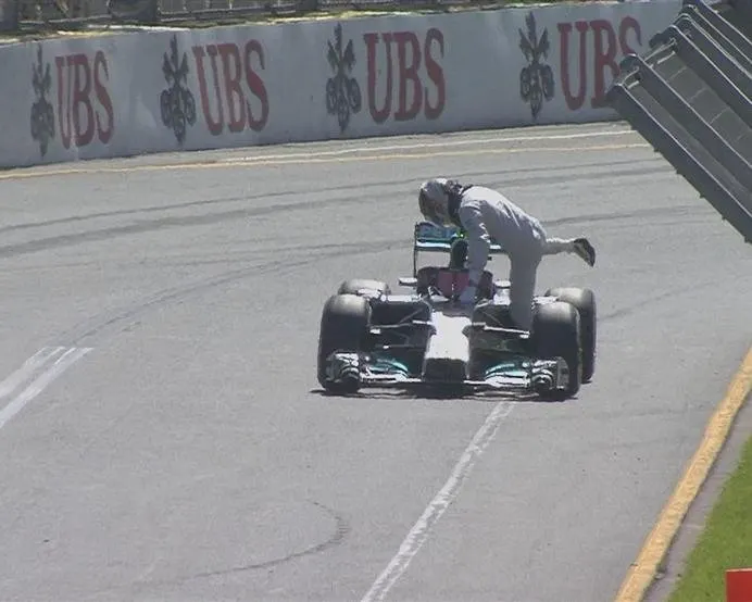  Despite being billed as the pre-season favourite, Lewis Hamilton climbs out of his stricken Mercedes on his first lap © FOWC Ltd. No reproduction without permission.