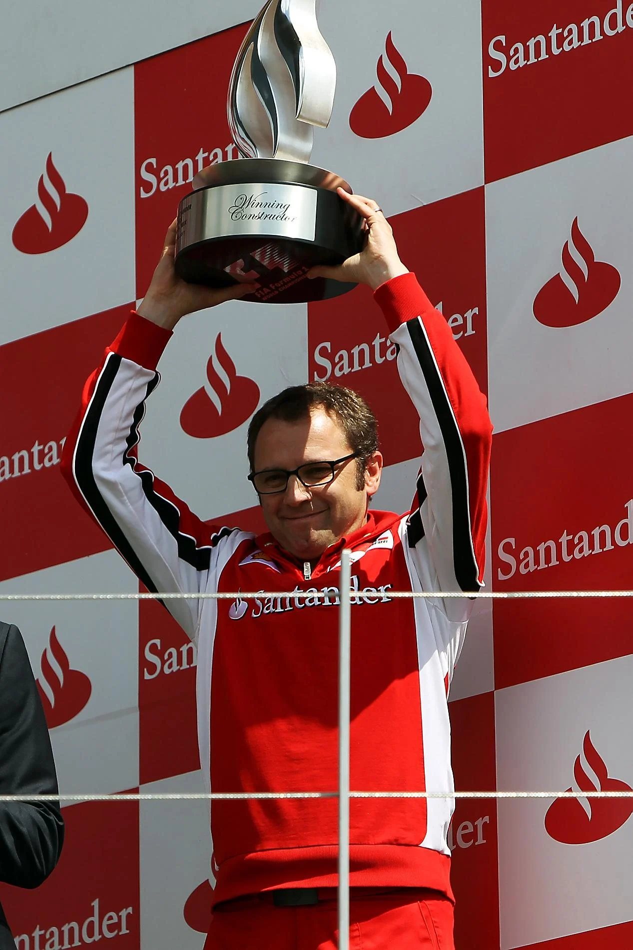 Stefano Domenicali (ITA) Ferrari General Director celebrates on the podium. Formula One World Championship, Rd 9, British Grand Prix, Race, Silverstone, England, Sunday, 10 July 2011. © Sutton Images