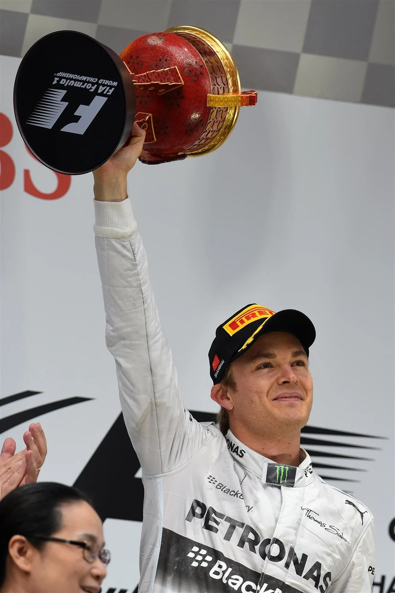 second placed Nico Rosberg (GER) Mercedes AMG F1 celebrates on the podium. Formula One World Championship, Rd4, Chinese Grand Prix, Race, Shanghai, China, Sunday, 20 April 2014. © Sutton Images