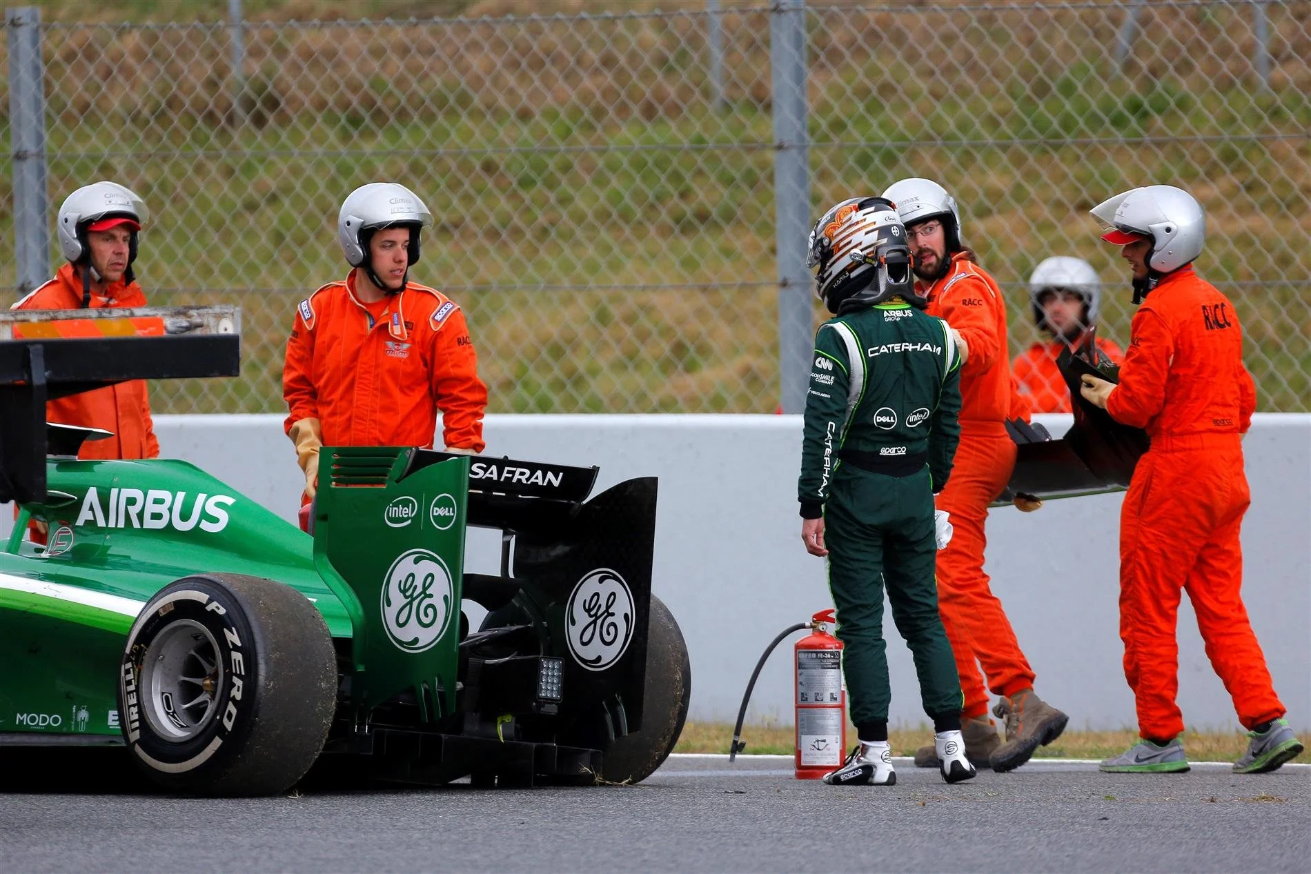 Kamui Kobayashi (JPN) Caterham CT05 crashed. Formula One Testing, Day One, Barcelona, Spain, Tuesday, 13 May 2014. © Sutton Images