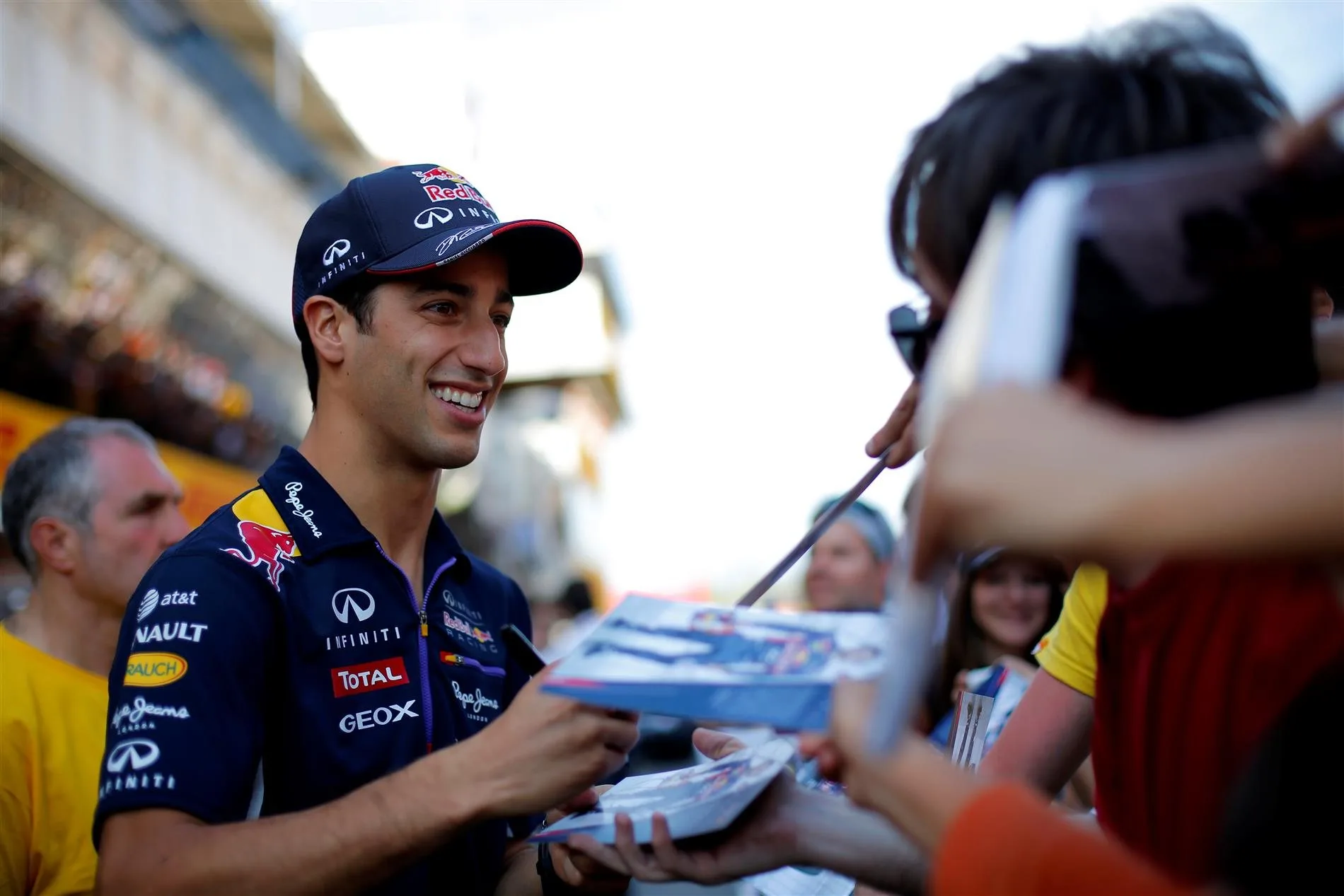 Daniel Ricciardo (AUS) Red Bull Racing signs autographs for the fans. Formula One World Championship, Rd5, Spanish Grand Prix, Preparations, Barcelona, Spain, Thursday, 8 May 2014. © Sutton Images