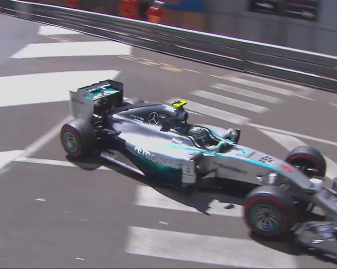 In the dying seconds of Q3, Mercedes' Nico Rosberg locks up into turn 5, Mirabeau, bringing out yellow flags and hindering team mate Lewis Hamilton's final lap. © FOWC Ltd