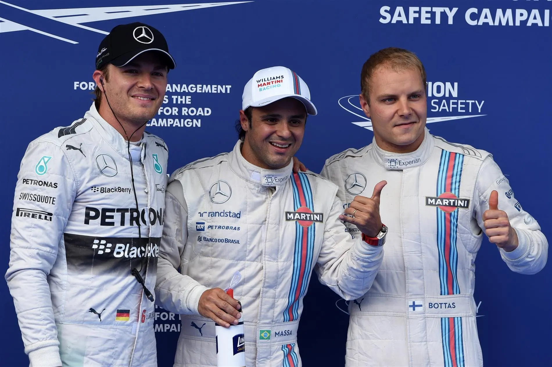 (L to R): Nico Rosberg (GER) Mercedes AMG F1, pole sitter Felipe Massa (BRA) Williams and Valtteri Bottas (FIN) Williams celebrate in parc ferme. Formula One World Championship, Rd8, Austrian Grand Prix, Qualifying, Spielberg, Austria, Saturday, 21 June 2014. © Sutton Images