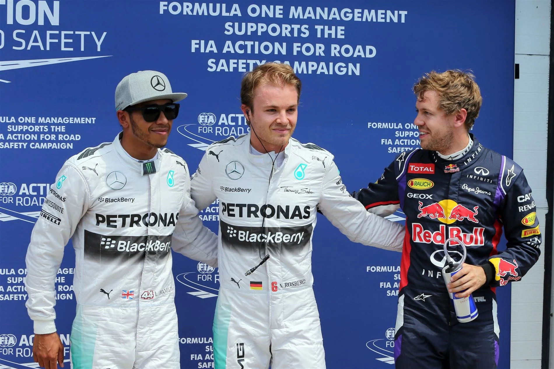(L to R): Lewis Hamilton (GBR) Mercedes AMG F1, pole sitter Nico Rosberg (GER) Mercedes AMG F1 and Sebastian Vettel (GER) Red Bull Racing celebrate in parc ferme. Formula One World Championship, Rd7, Canadian Grand Prix, Qualifying, Montreal, Canada, Saturday, 7 June 2014. © Sutton Images