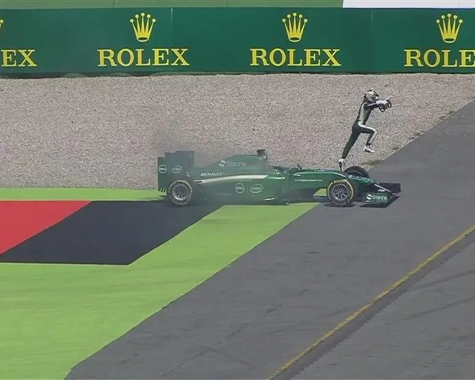 More bad news for Caterham as the rear of Kamui Kobayashi's car catches fire. The Japanese driver parks up and leaps clear. © FOWC Ltd