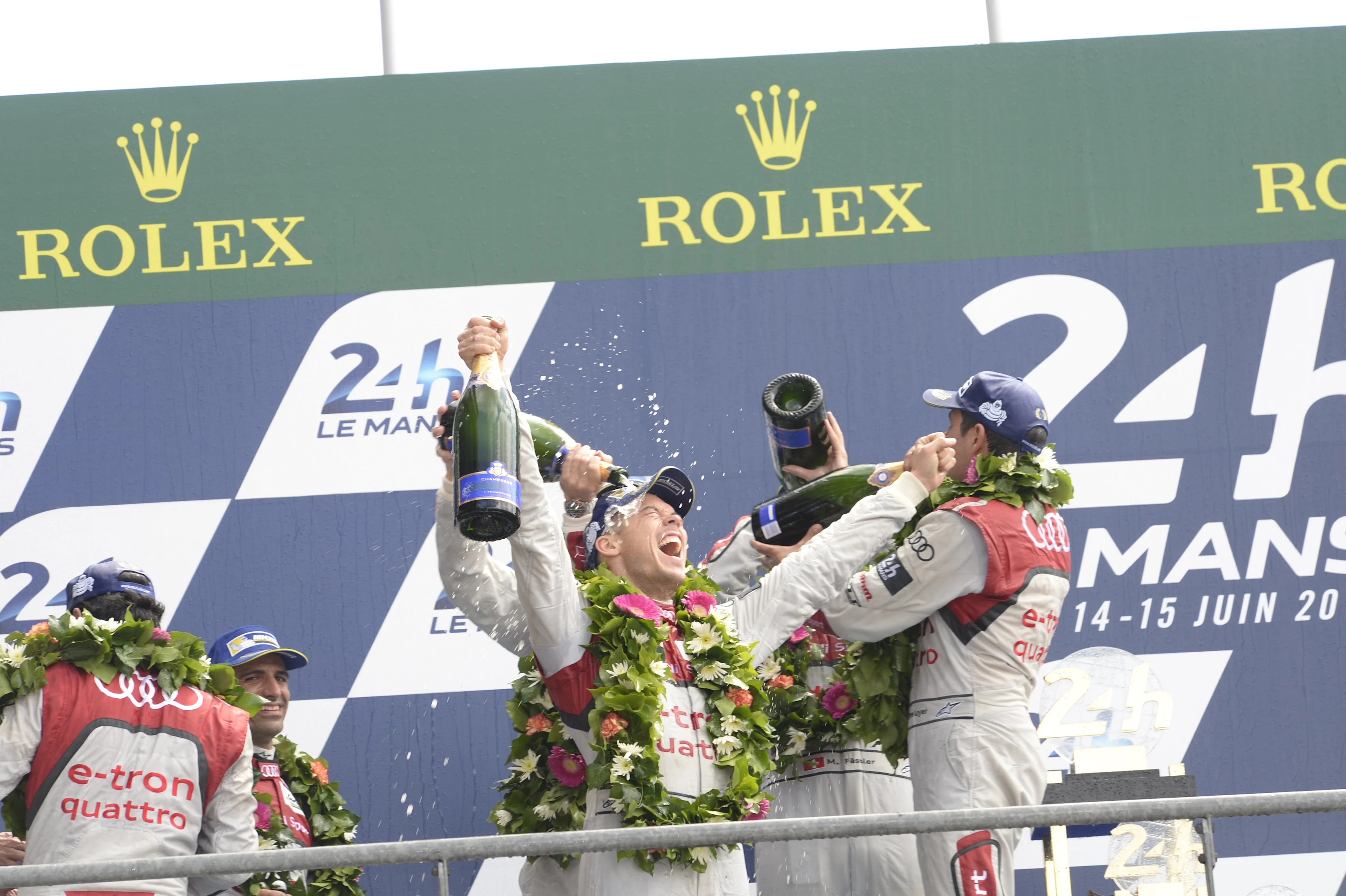 2014 Le Mans 24 Hours. Circuit de la Sarthe, Le Mans, France. Sunday 15 June 2014. Marcel Fassler (CHE), Andre Lotterer (DEU), Benoit Treluyer (FRA) - Audi Sport Team Joest, Audi R18 e-tron Quattro, win the Le Mans 24 Hours. © LAT Photographic