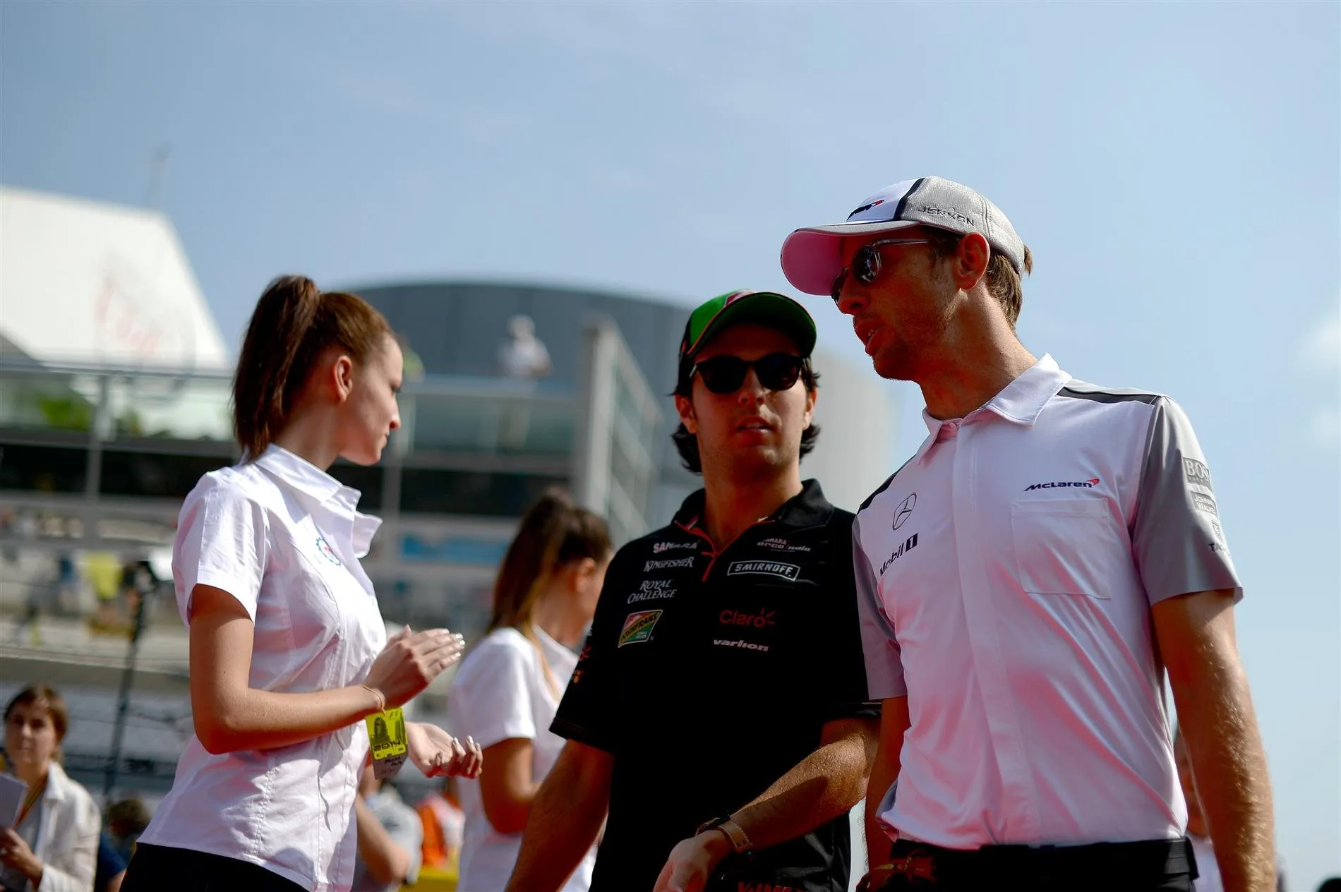 (L to R): Sergio Perez (MEX) Force India and Jenson Button (GBR) McLaren on the drivers parade. Formula One World Championship, Rd13, Italian Grand Prix, Monza, Italy, Race Day, Sunday, 7 September 2014