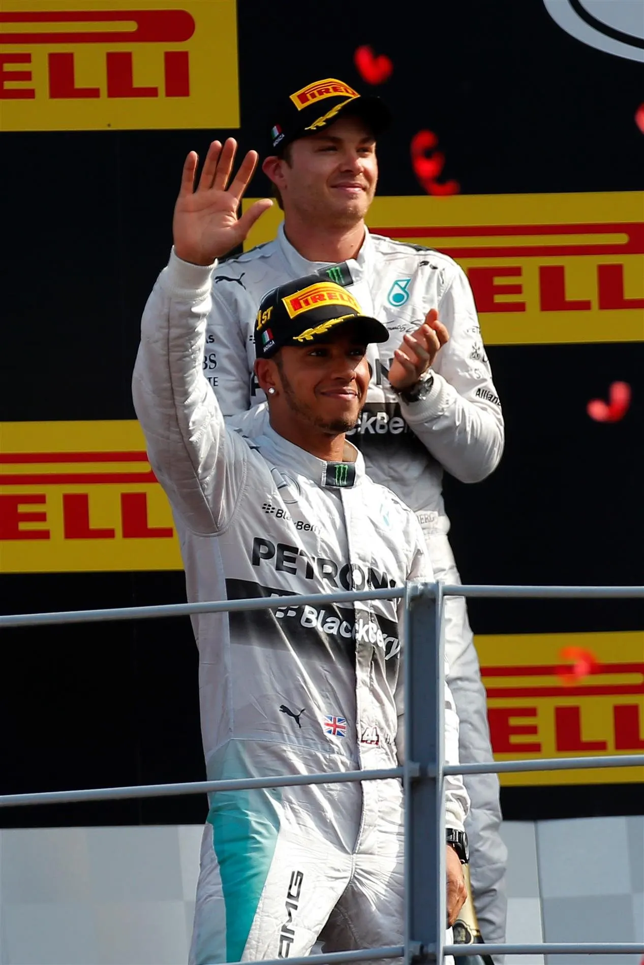 Race winner Lewis Hamilton (GBR) Mercedes AMG F1, on the podium with second placed Nico Rosberg (GER) Mercedes AMG F1. Formula One World Championship, Rd13, Italian Grand Prix, Monza, Italy, Race Day, Sunday, 7 September 2014