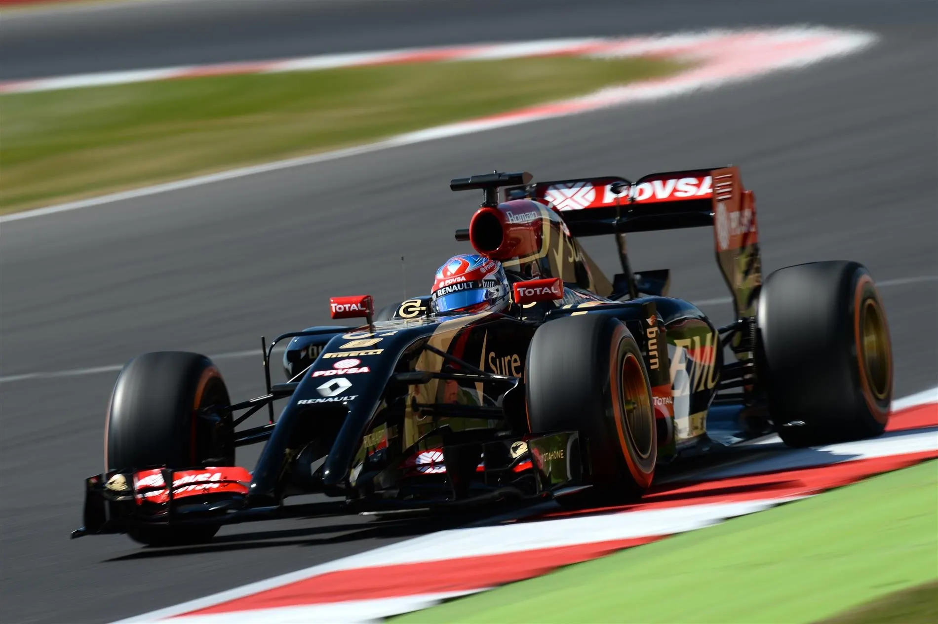 Romain Grosjean (FRA) Lotus E22. Formula One World Championship, Rd9, British Grand Prix, Practice, Silverstone, England, Friday, 4 July 2014