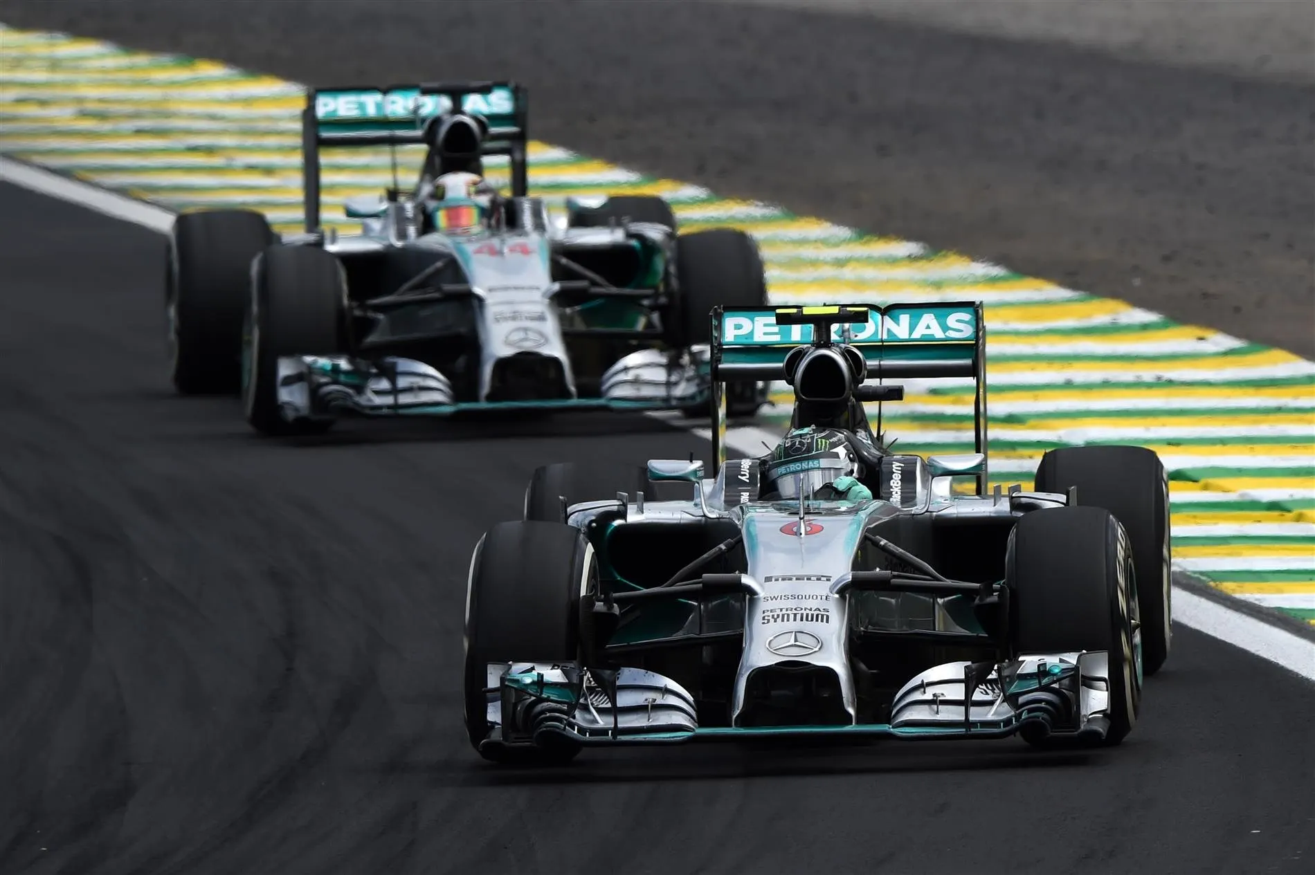 Nico Rosberg (GER) Mercedes AMG F1 W05 leads Lewis Hamilton (GBR) Mercedes AMG F1 W05. Formula One World Championship, Rd18, Brazilian Grand Prix, Race, Sao Paulo, Brazil, Sunday, 9 November 2014