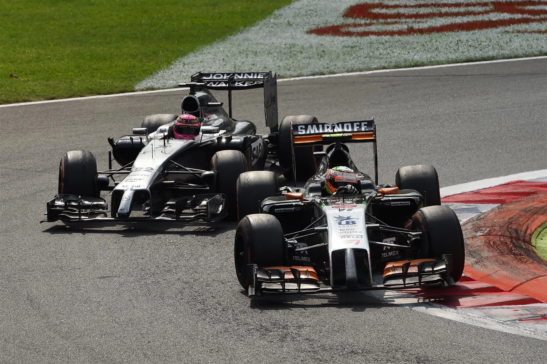 Sergio Perez (MEX) Force India VJM07 leads Jenson Button (GBR) McLaren MP4-29. Formula One World Championship, Rd13, Italian Grand Prix, Monza, Italy, Race Day, Sunday, 7 September 2014