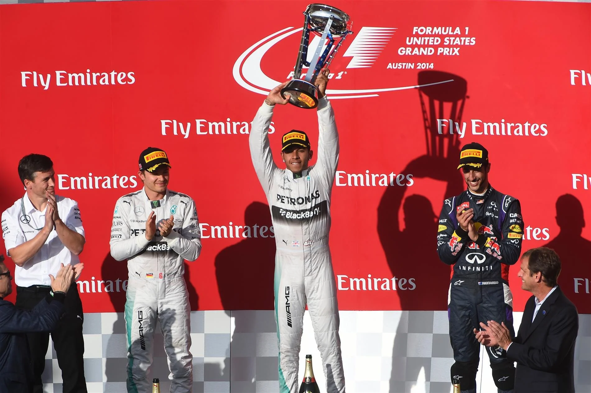 Podium and results: 1st Lewis Hamilton (GBR) Mercedes AMG F1, centre. 2nd Nico Rosberg (GER) Mercedes AMG F1,left. 3rd Daniel Ricciardo (AUS) Red Bull Racing, right.# Rob Thomas (GBR) Mercedes AMG F1 Operations and Quality Director MHPE, far left. Formula One World Championship, Rd17, United States Grand Prix, Race, Austin, Texas, USA, Sunday, 2 November 2014