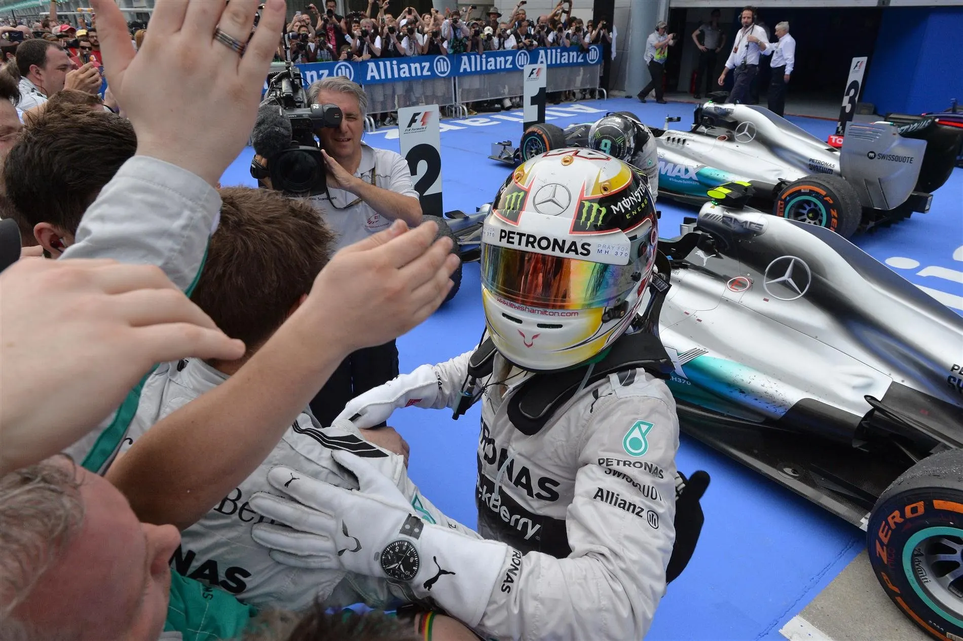 Race winner Lewis Hamilton (GBR) Mercedes AMG F1 celebrates in parc ferme. Formula One World Championship, Rd2, Malaysian Grand Prix, Race, Sepang, Malaysia, Sunday, 30 March 2014