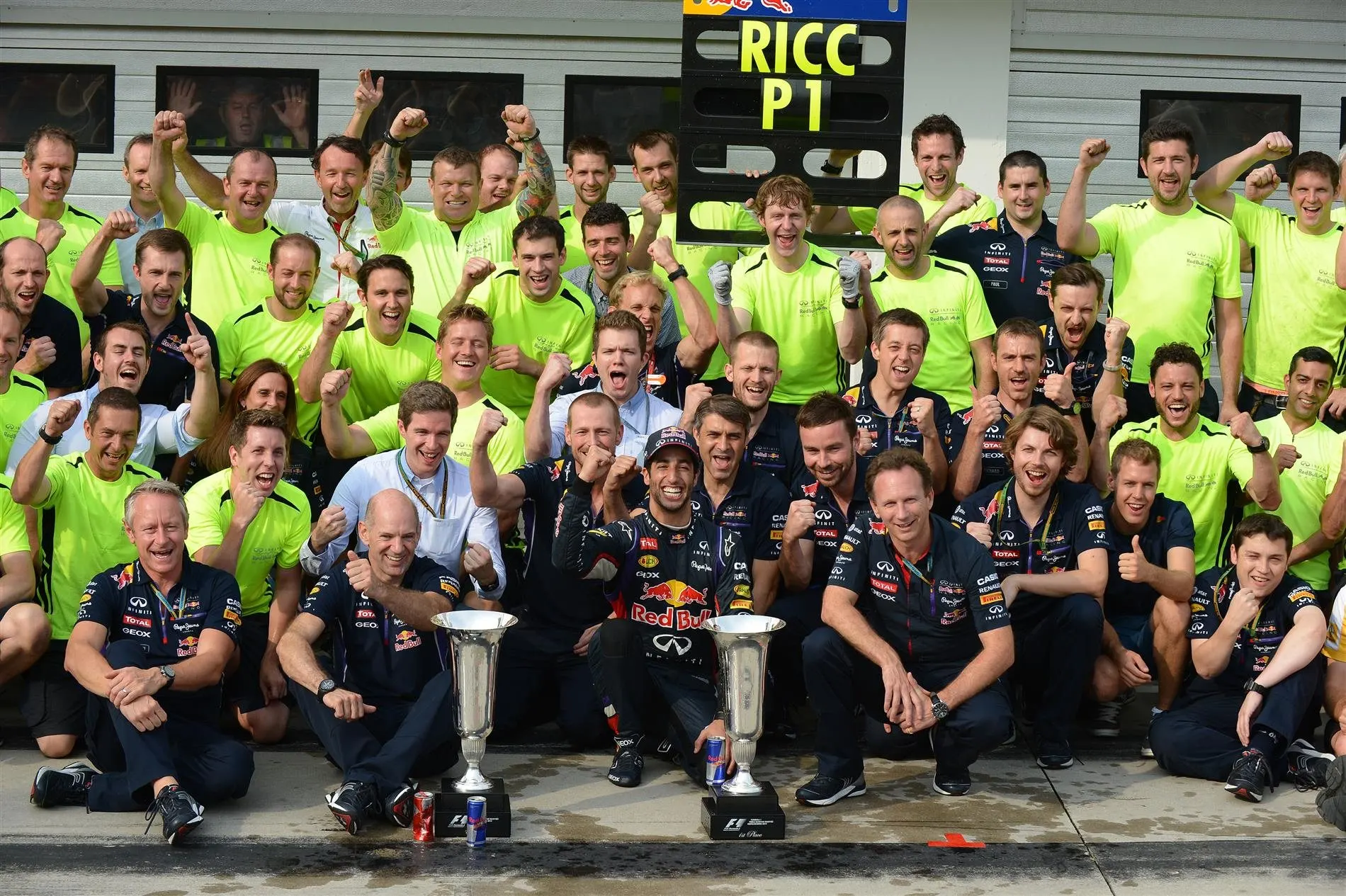 Race winner Daniel Ricciardo (AUS) Red Bull Racing celebrates with the team. Formula One World Championship, Rd11, Hungarian Grand Prix, Race Day, Hungaroring, Hungary. Sunday, 27 July 2014