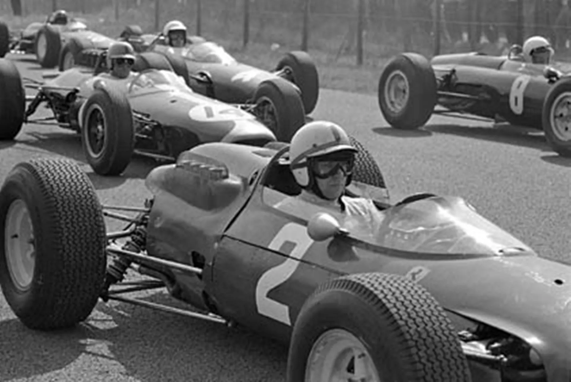 Zandvoort, May 1964: John Surtees on the grid for the Dutch Grand Prix. Second place in the race gave him his first points of the season and set him on his way to the 1964 world championship. © Schlegelmilch © No reproduction without permission.
