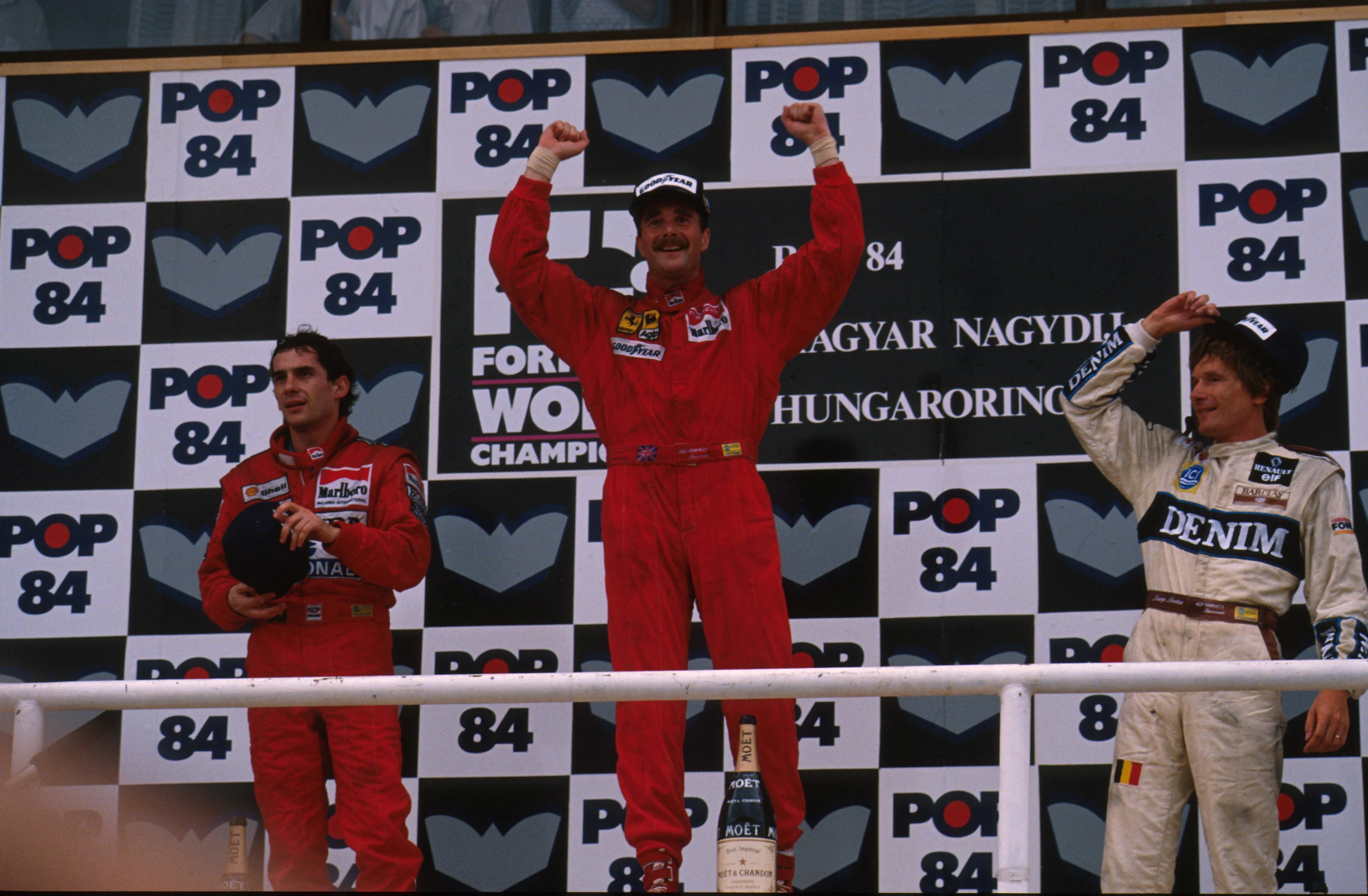 Nigel Mansell (GBR). Wins for Farrari.\r\nHungarian Grand Prix, Hungaroring, 13 August 1989