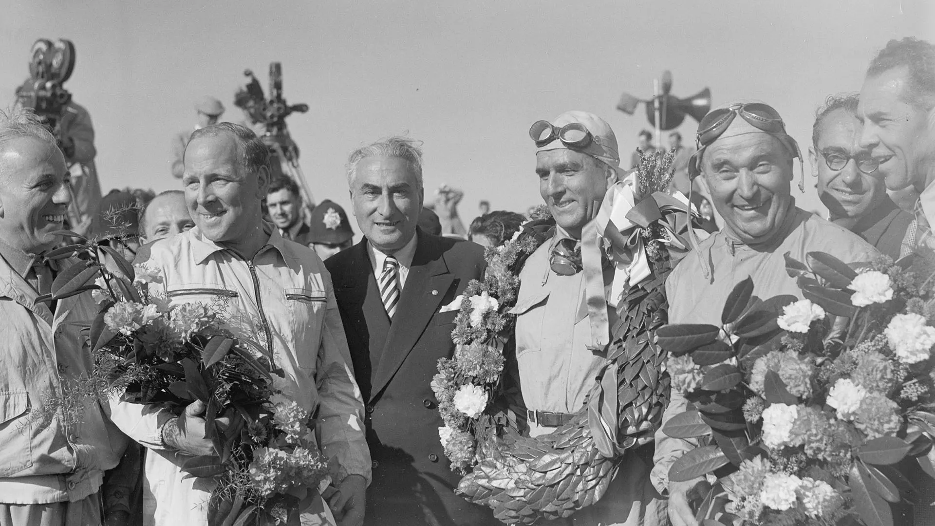Farina (c), Fagioli (r) and Parnell (l) were the top three in the first Grand Prix – and not a solid helmet between them! 