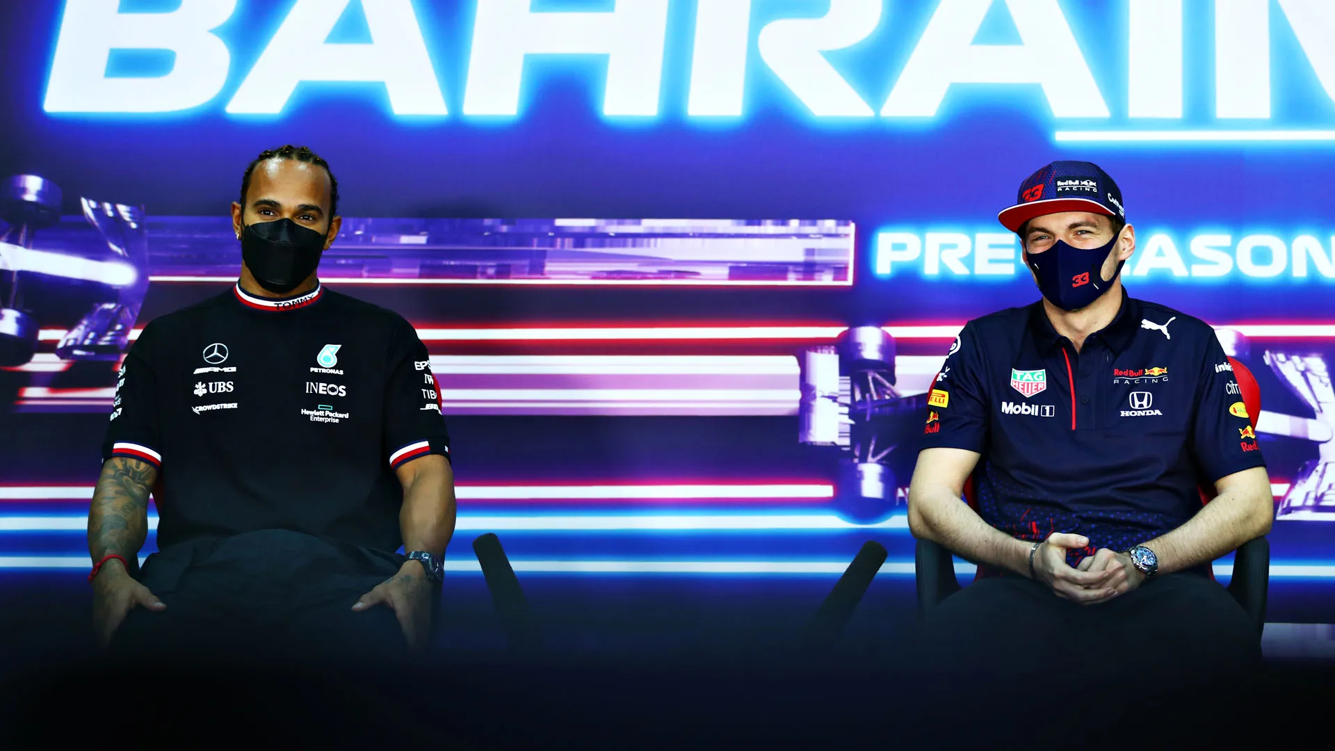 BAHRAIN, BAHRAIN - MARCH 14: Lewis Hamilton of Great Britain and Mercedes GP and Max Verstappen of