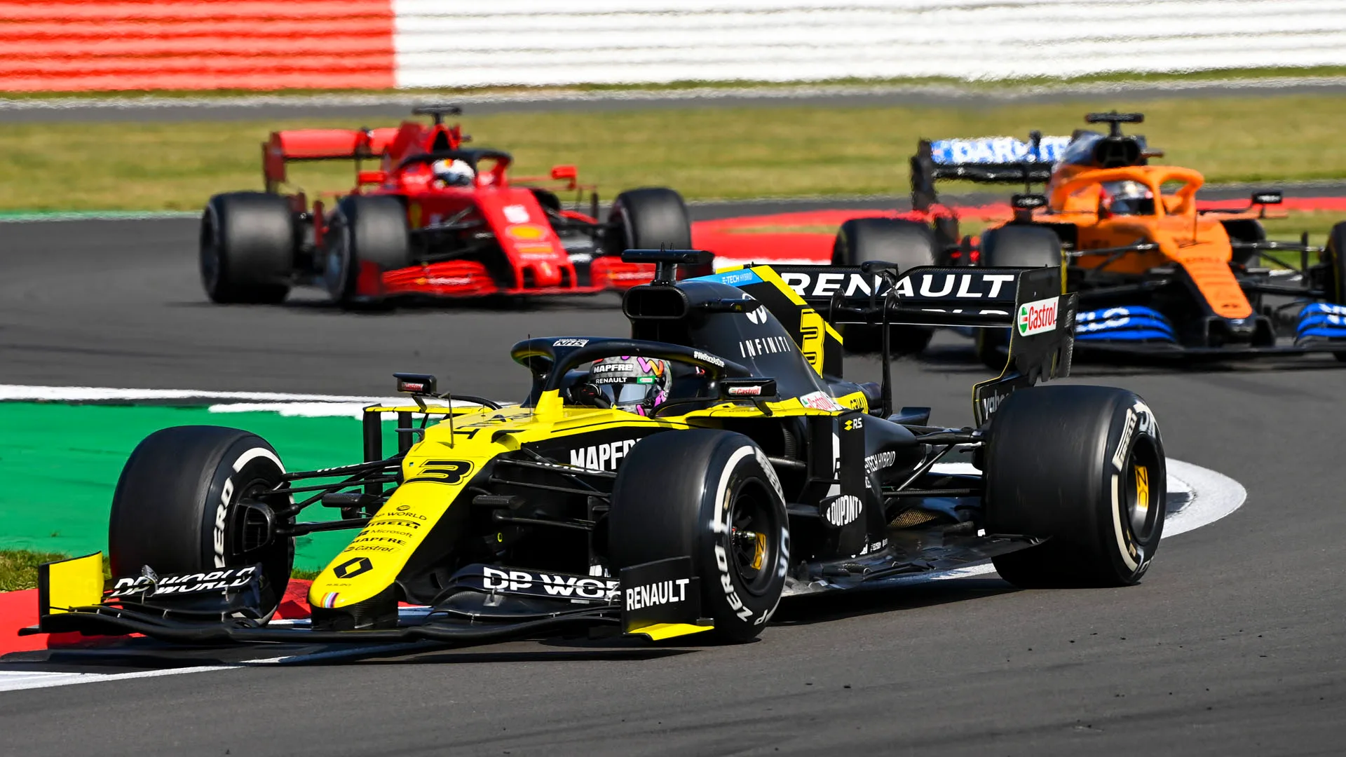 Daniel Ricciardo, Renault R.S.20, leads Carlos Sainz, McLaren MCL35, and Sebastian Vettel, Ferrari