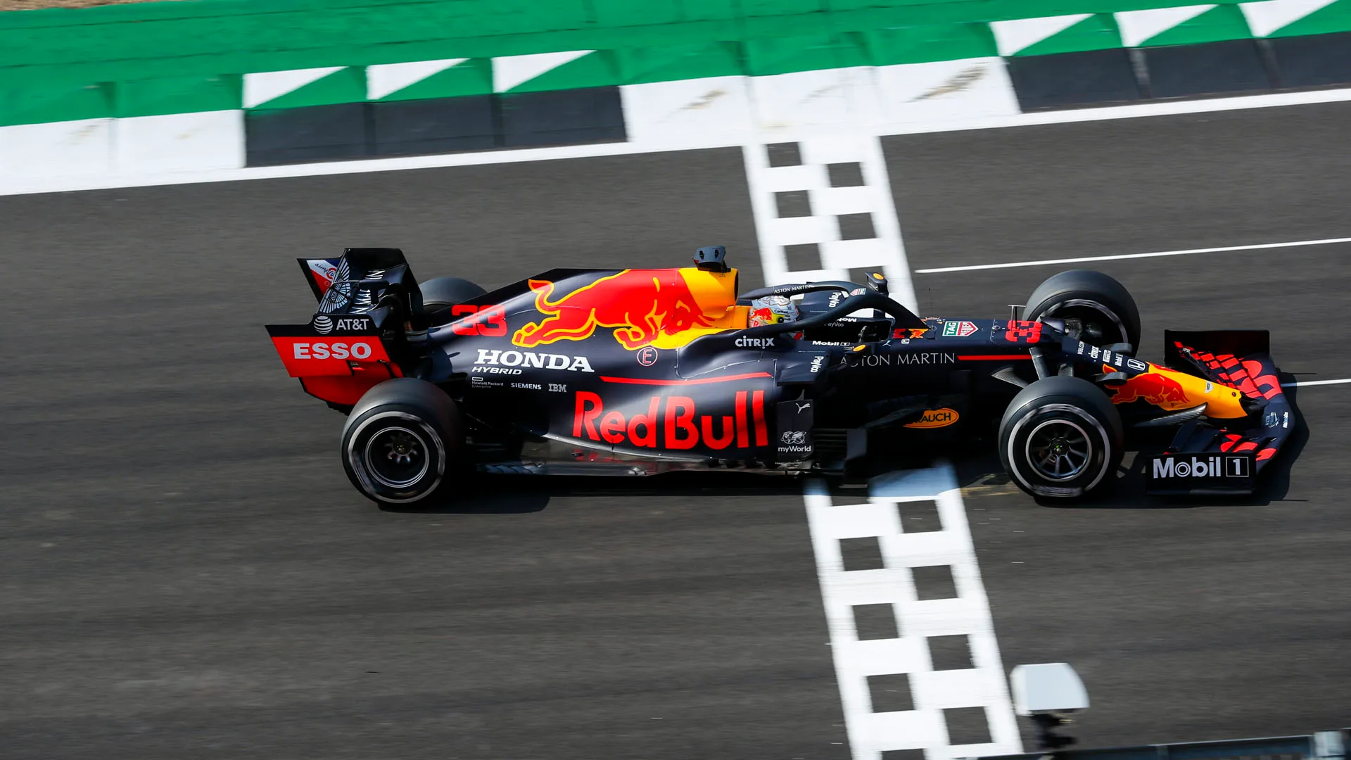 Race Winner Max Verstappen, Red Bull Racing RB16 crosses the finish