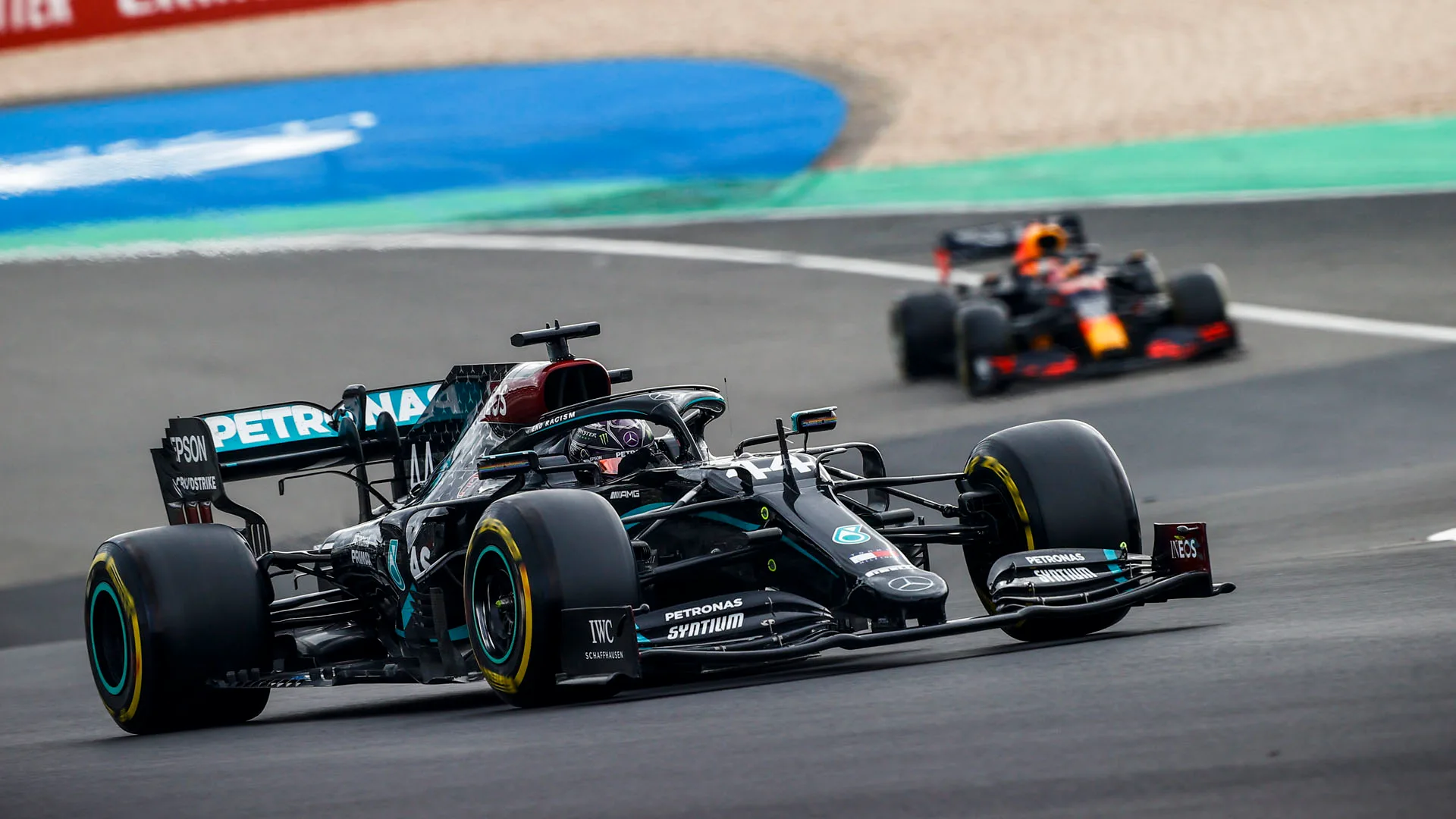 Lewis Hamilton, Mercedes F1 W11 EQ Performance, leads Max Verstappen, Red Bull Racing