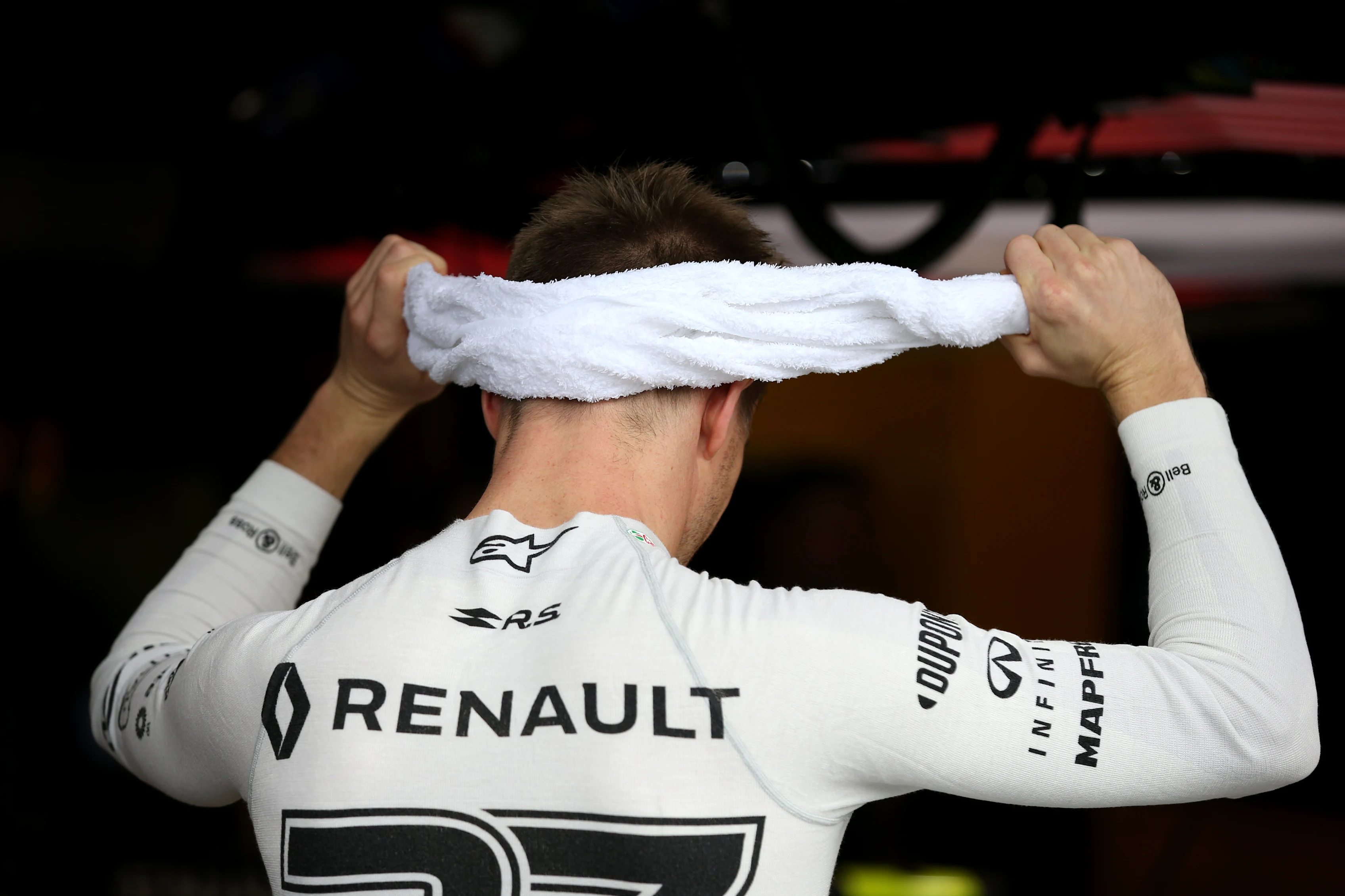 SINGAPORE, SINGAPORE - SEPTEMBER 20: Nico Hulkenberg of Germany and Renault Sport F1 tries to cool