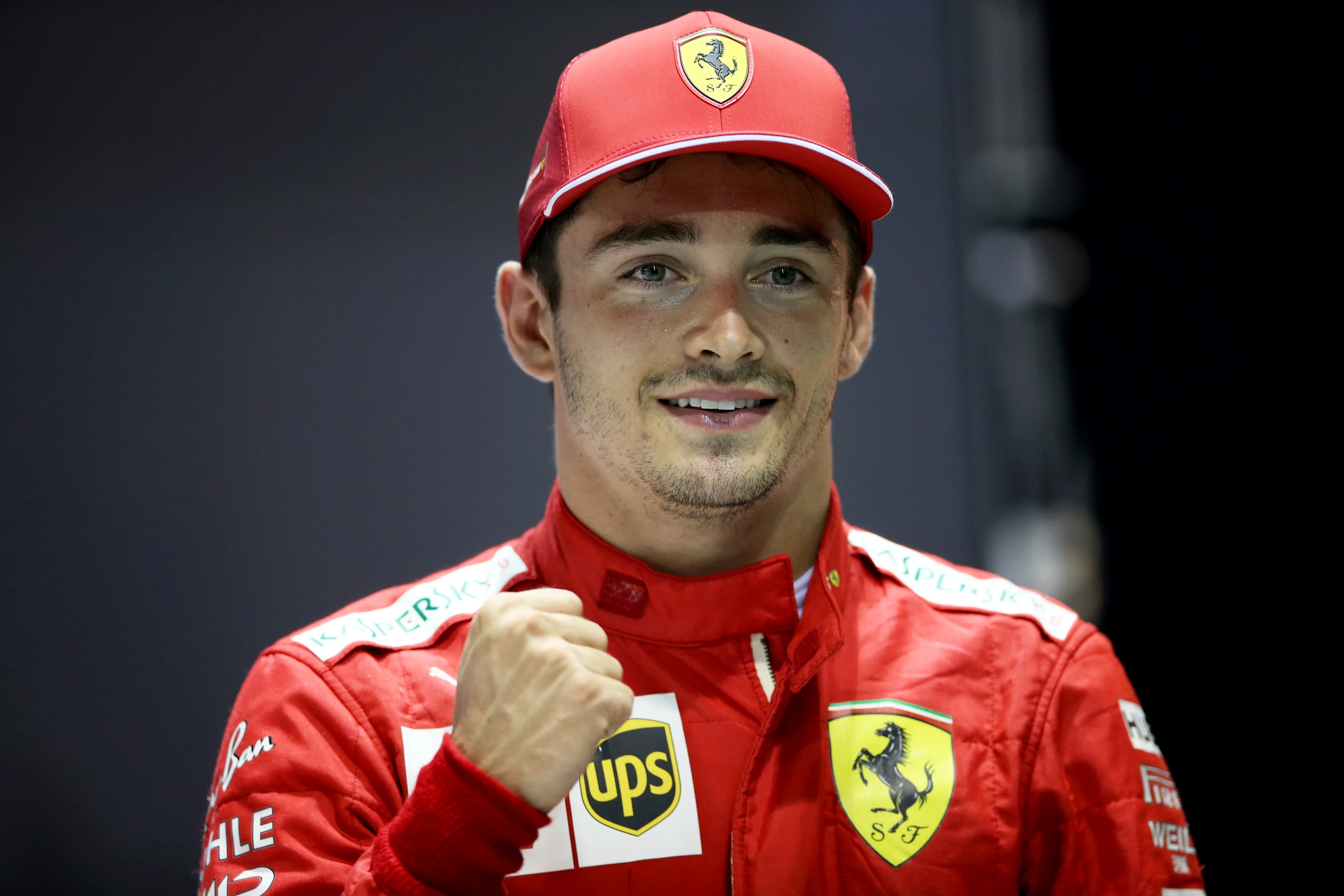 SINGAPORE, SINGAPORE - SEPTEMBER 21: Pole position qualifier Charles Leclerc of Monaco and Ferrari