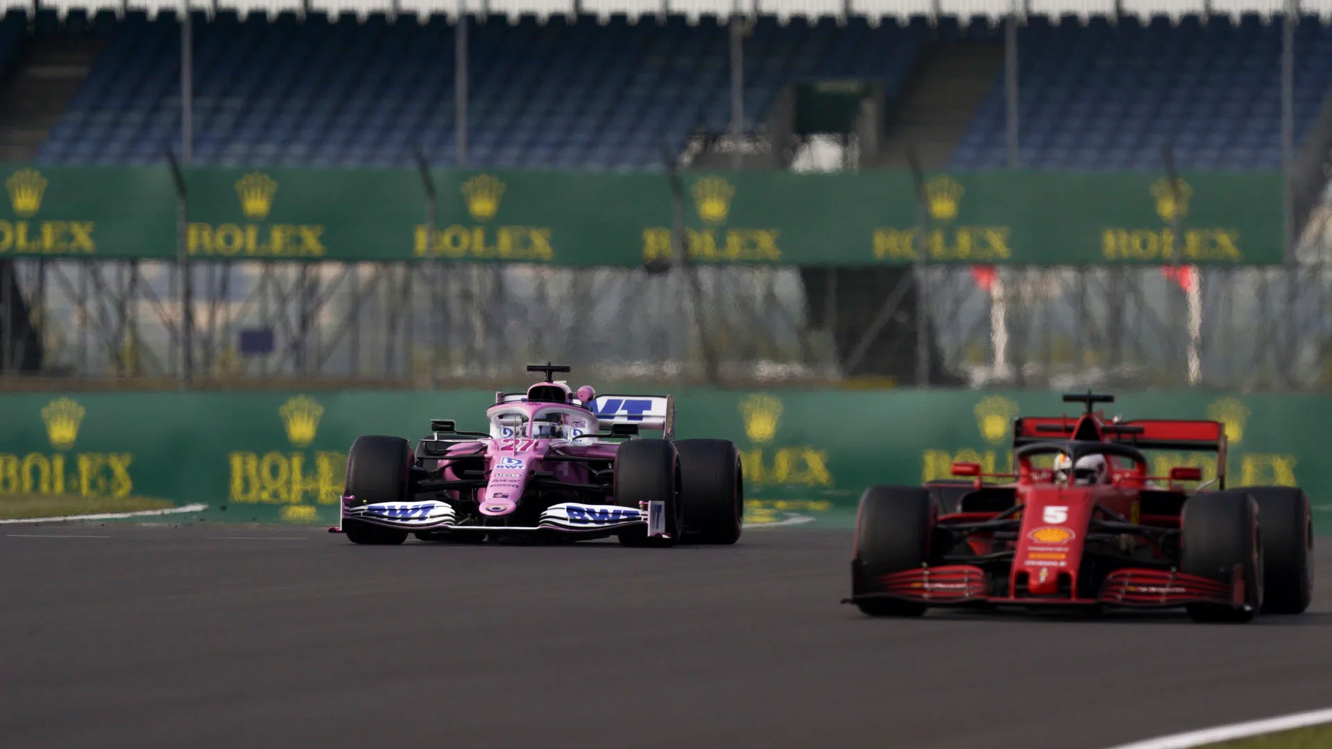 German Formula One driver Nico Hulkenberg of BWT Racing Point (L) and German Formula One driver