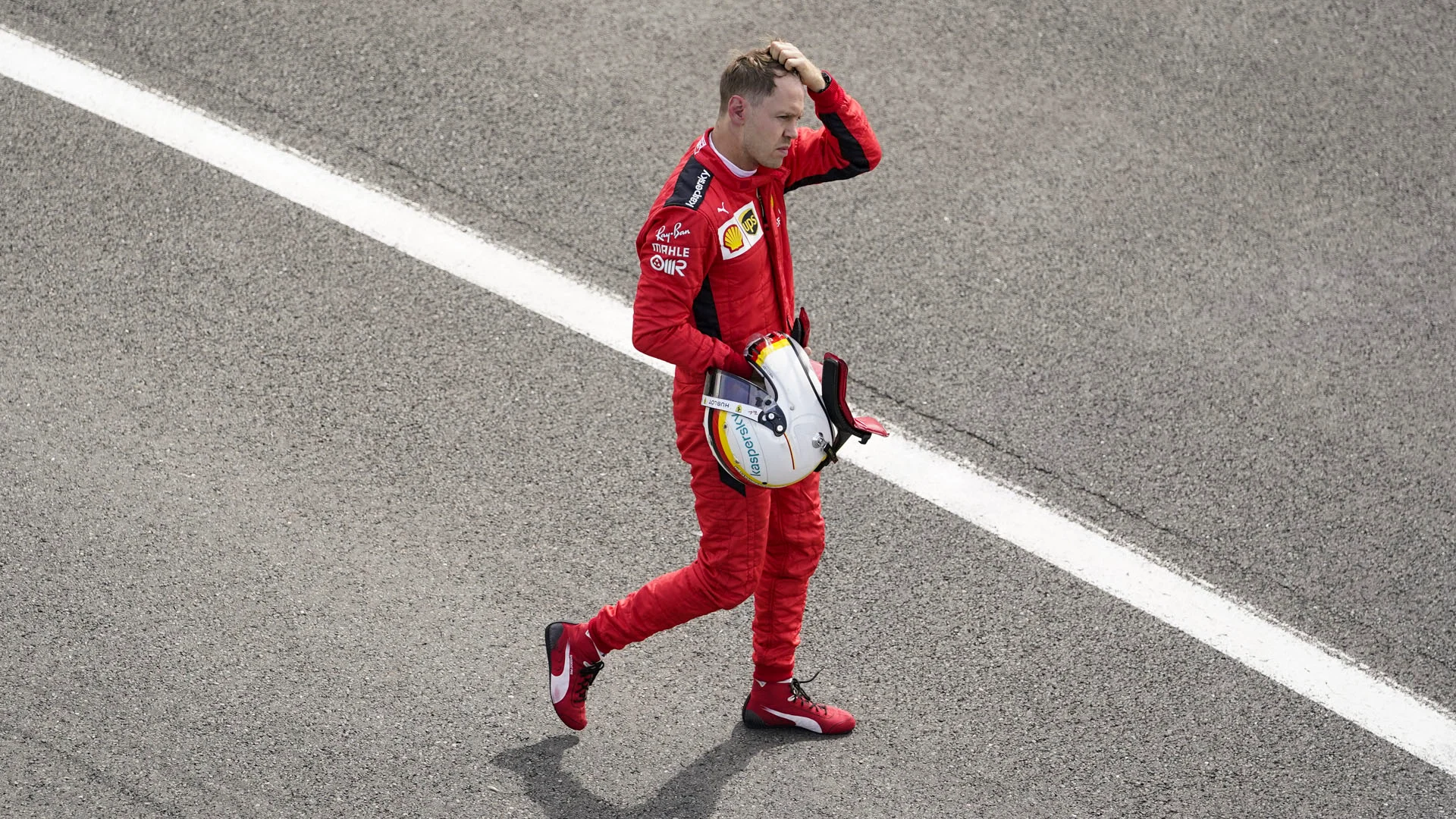German Formula One driver Sebastian Vettel of Scuderia Ferrari reacts after the 2020 Formula One