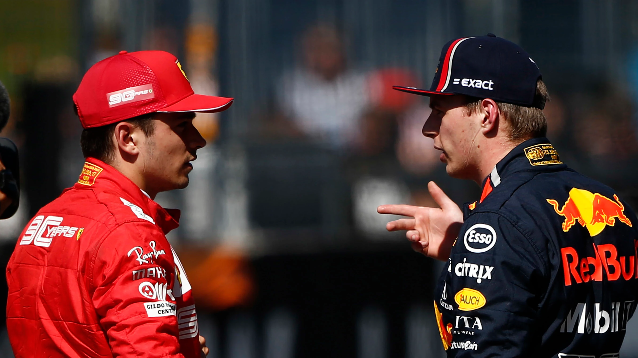 RED BULL RING, AUSTRIA - JUNE 29: Pole man Charles Leclerc, Ferrari, talks to Max Verstappen, Red
