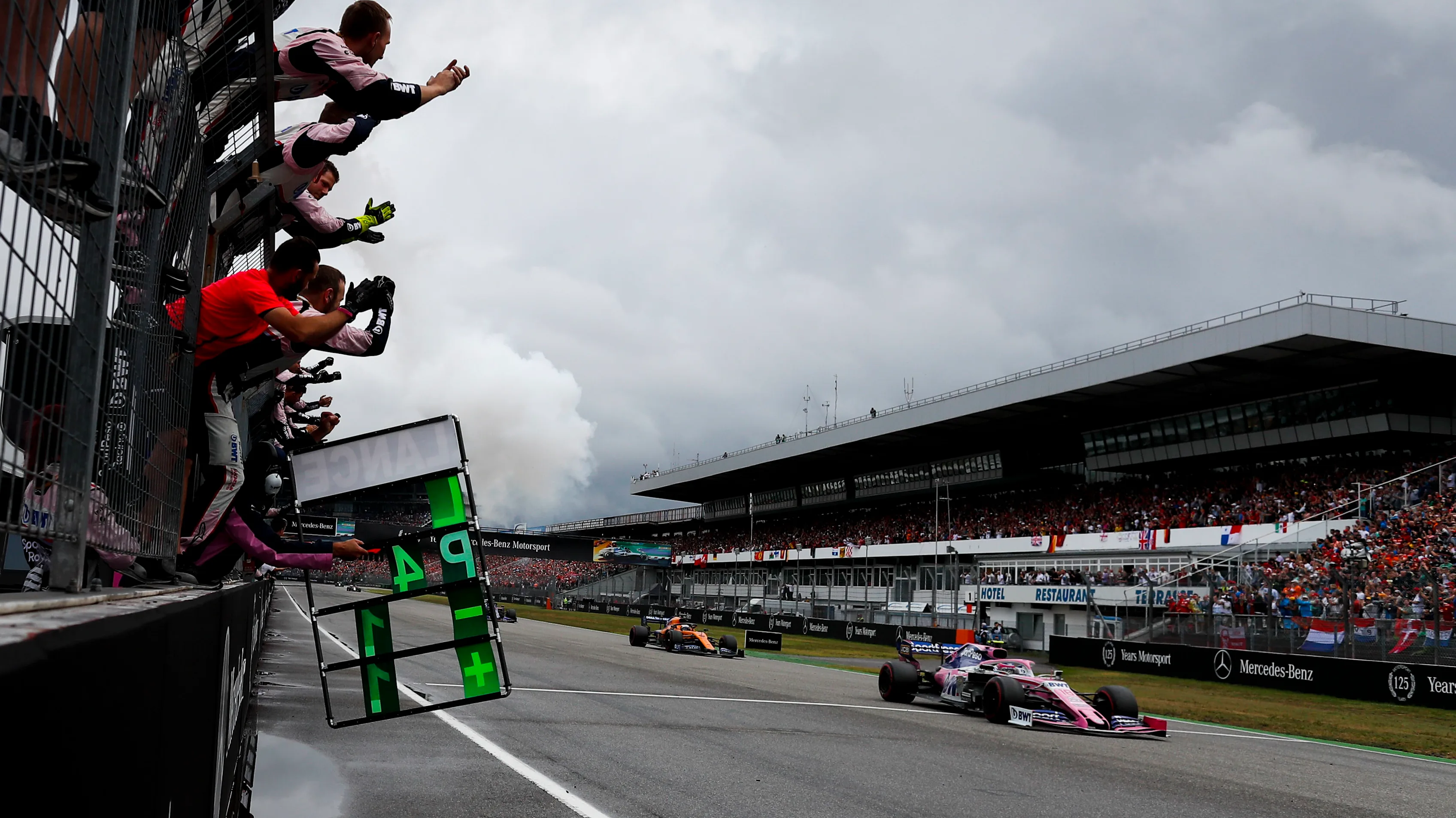 HOCKENHEIMRING, GERMANY - JULY 28: Racing Point mechanics celebrate as Lance Stroll, Racing Point