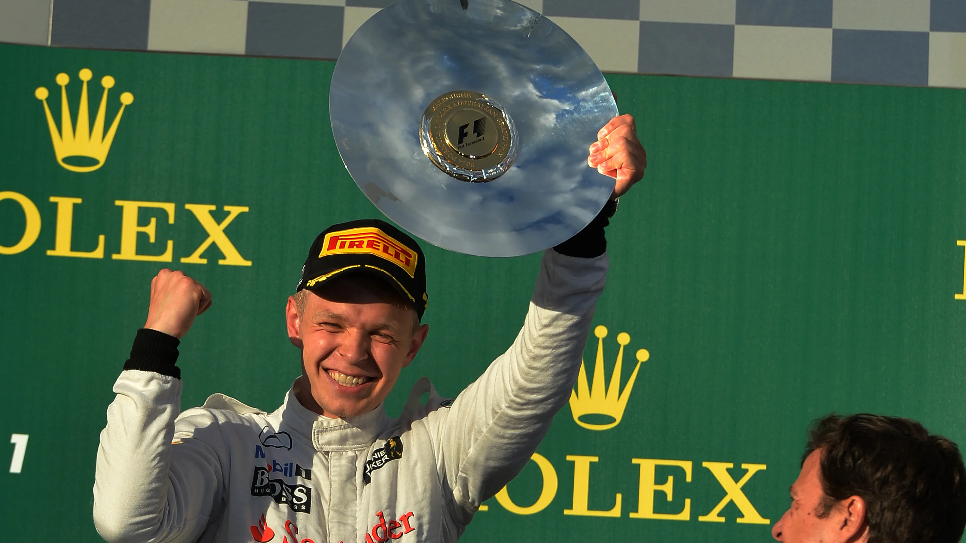 Kevin Magnussen (DEN) McLaren celebrates third place on the podium. Formula One World