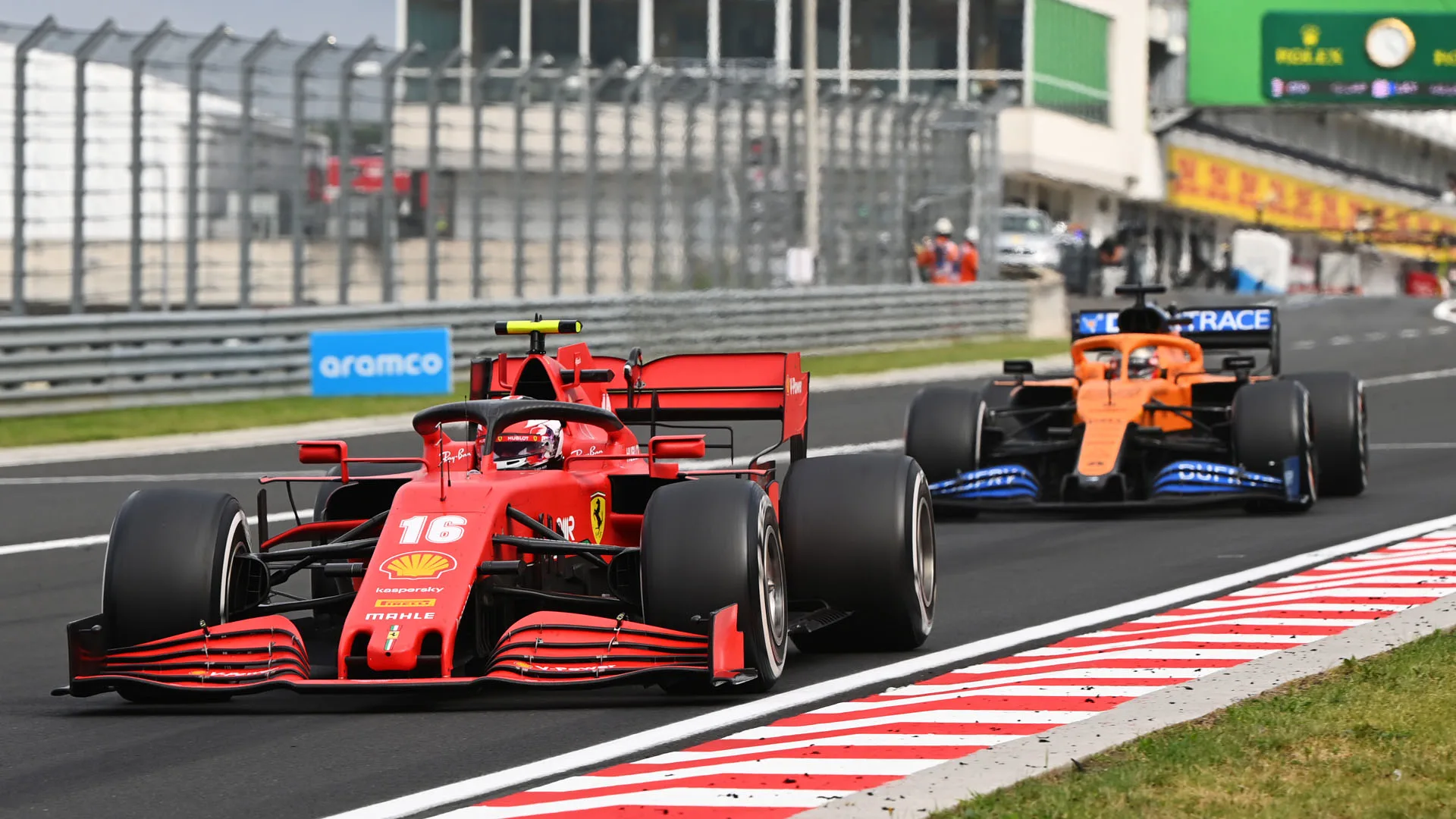 Charles Leclerc, Ferrari SF1000, leads Carlos Sainz, McLaren