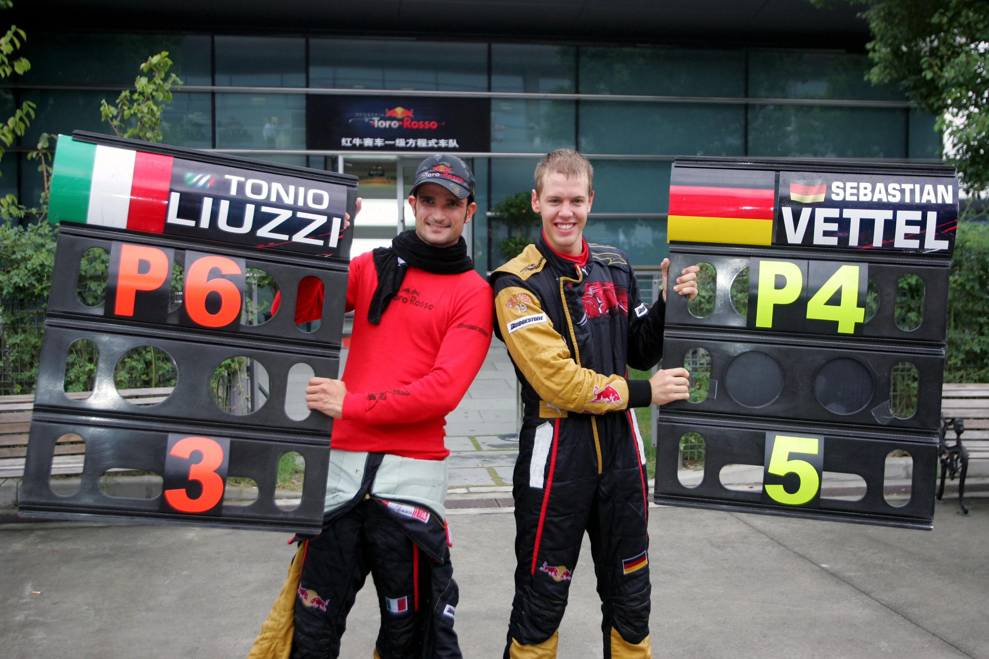 Vitantonio Liuzzi (ITA) Scuderia Toro Rosso and Sebastian Vettel (GER) Scuderia Toro Rosso