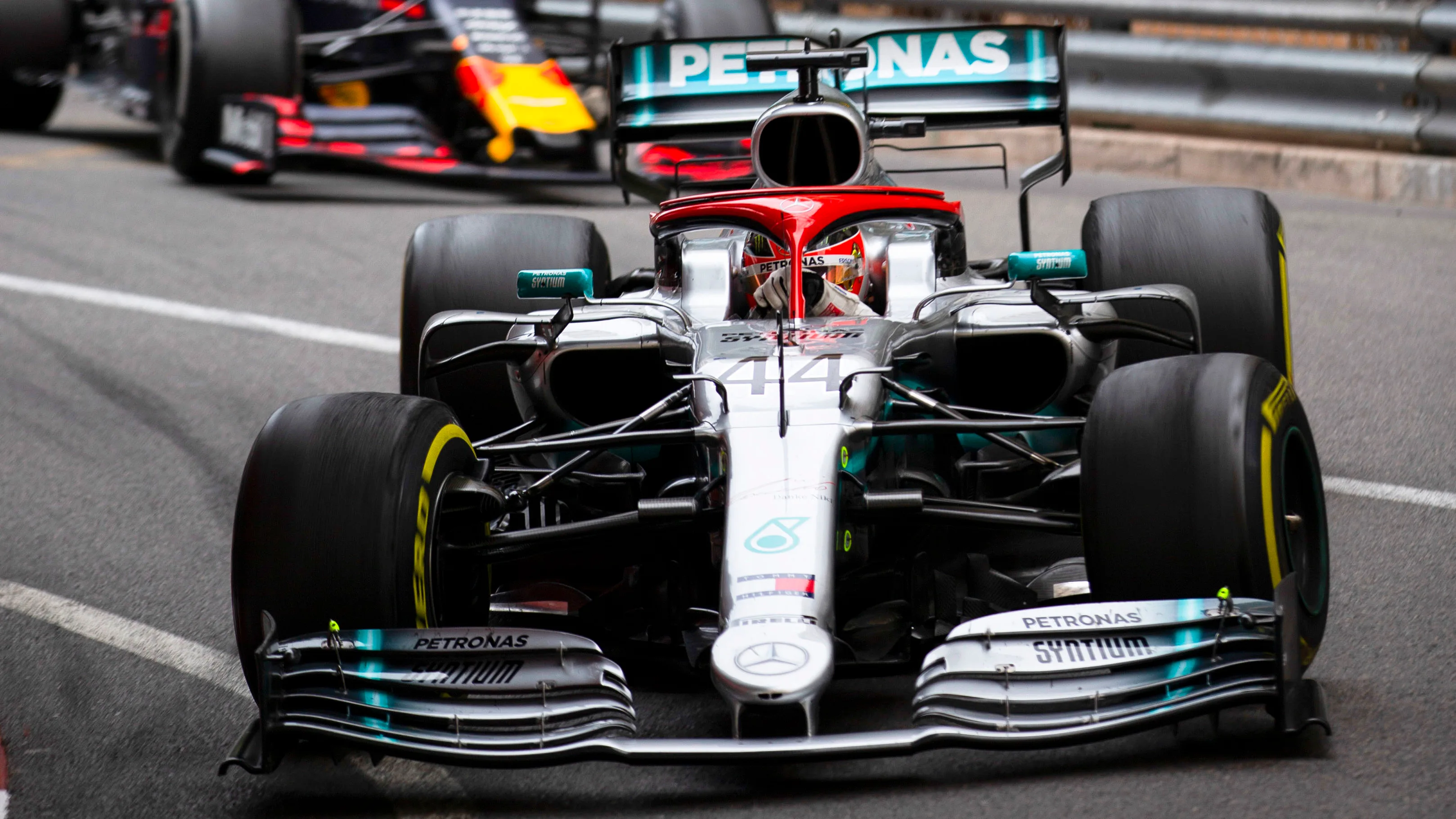 MONTE CARLO, MONACO - MAY 26: Lewis Hamilton, Mercedes AMG F1 W10, leads Max Verstappen, Red Bull